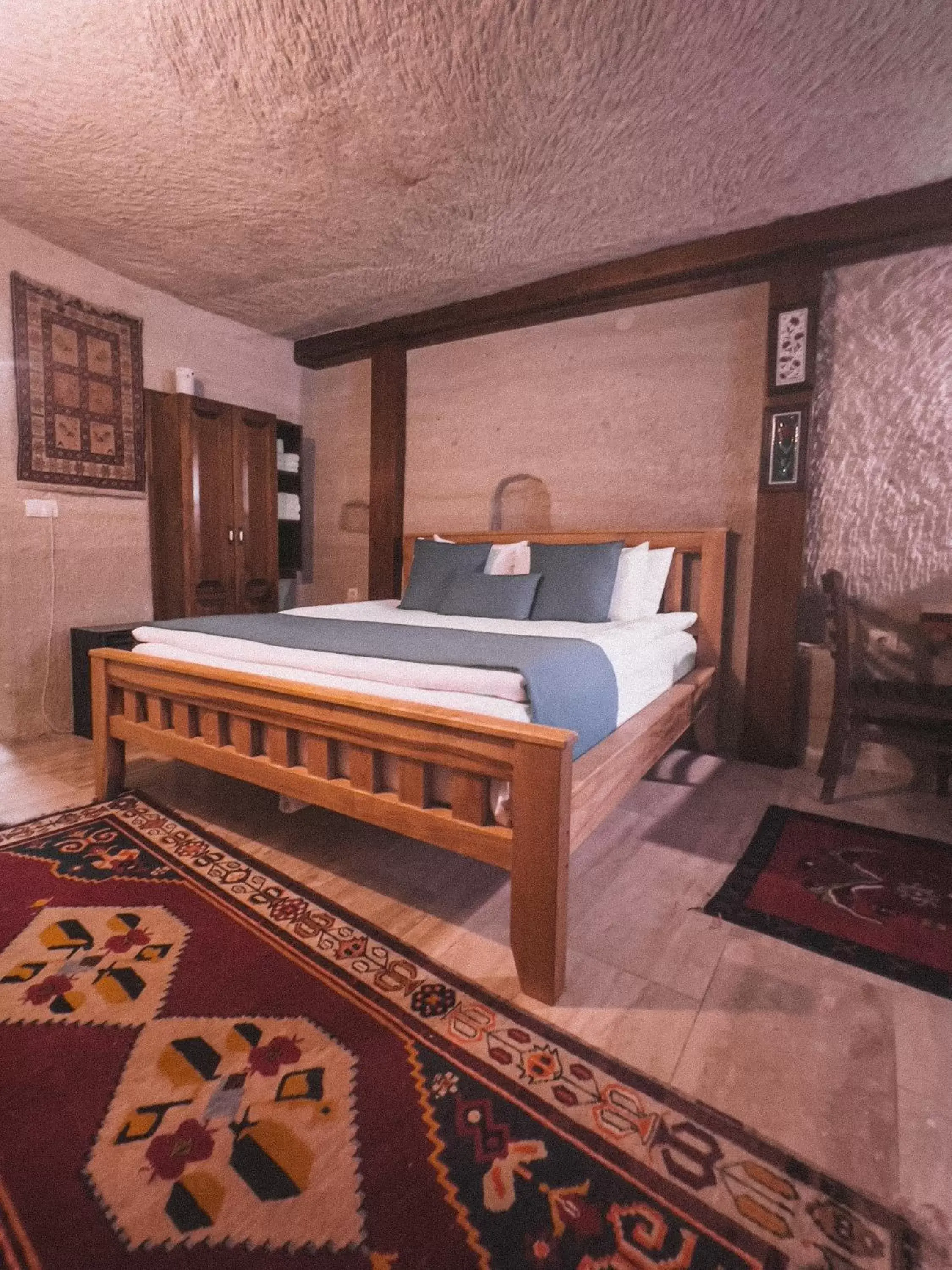 Bed in Local Cave House Hotel