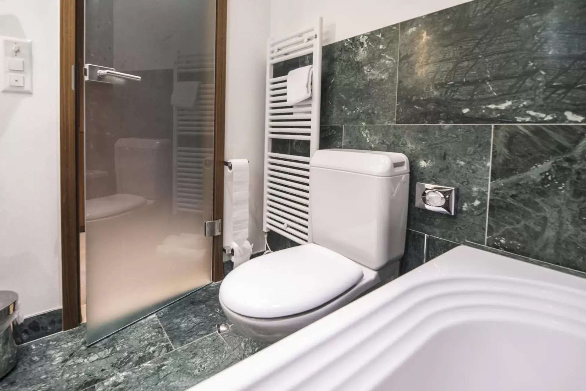 Bathroom in Waldhotel & SPA Davos - for body & soul