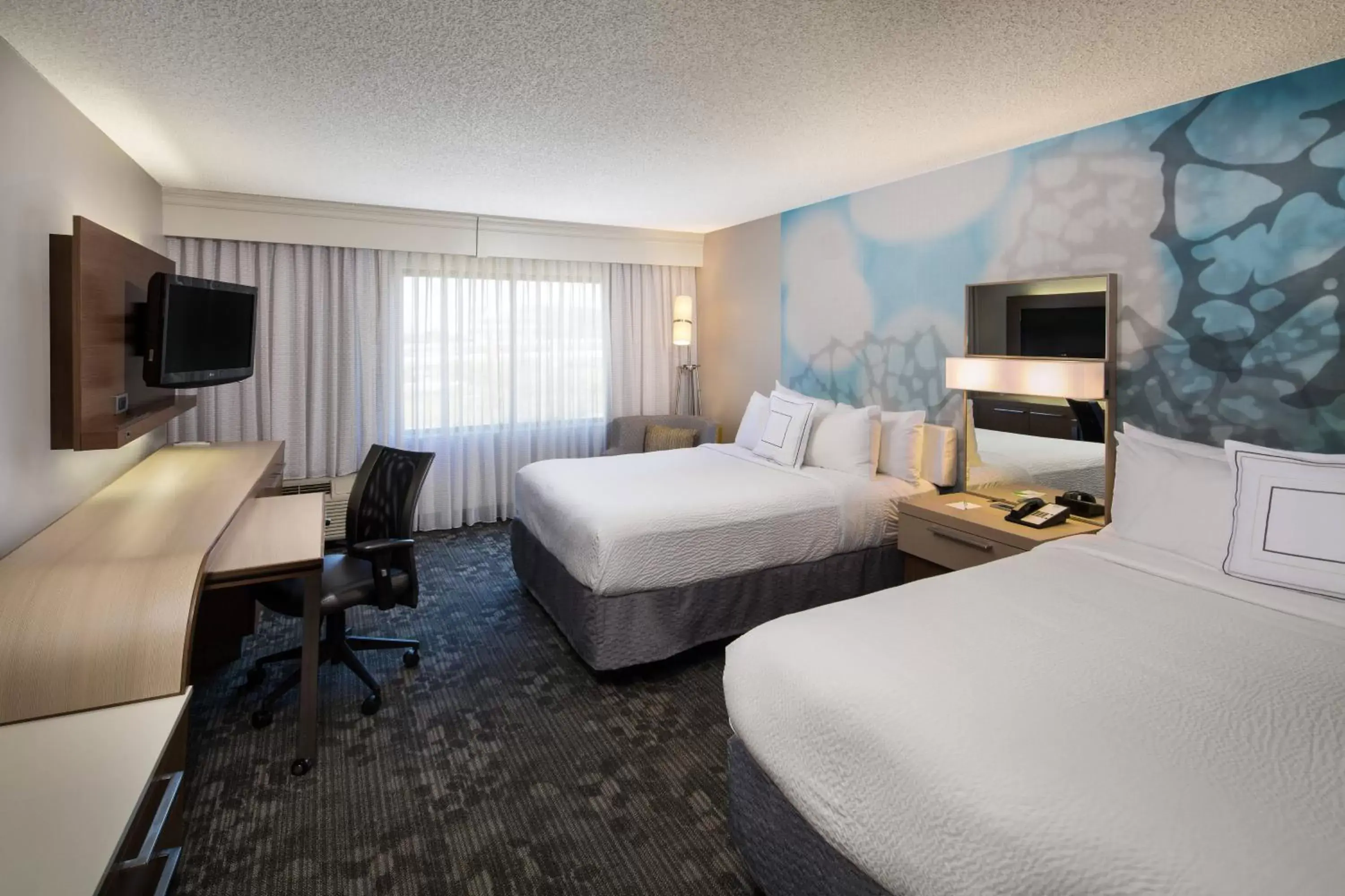 Photo of the whole room, TV/Entertainment Center in Courtyard by Marriott San Antonio Airport/North Star Mall