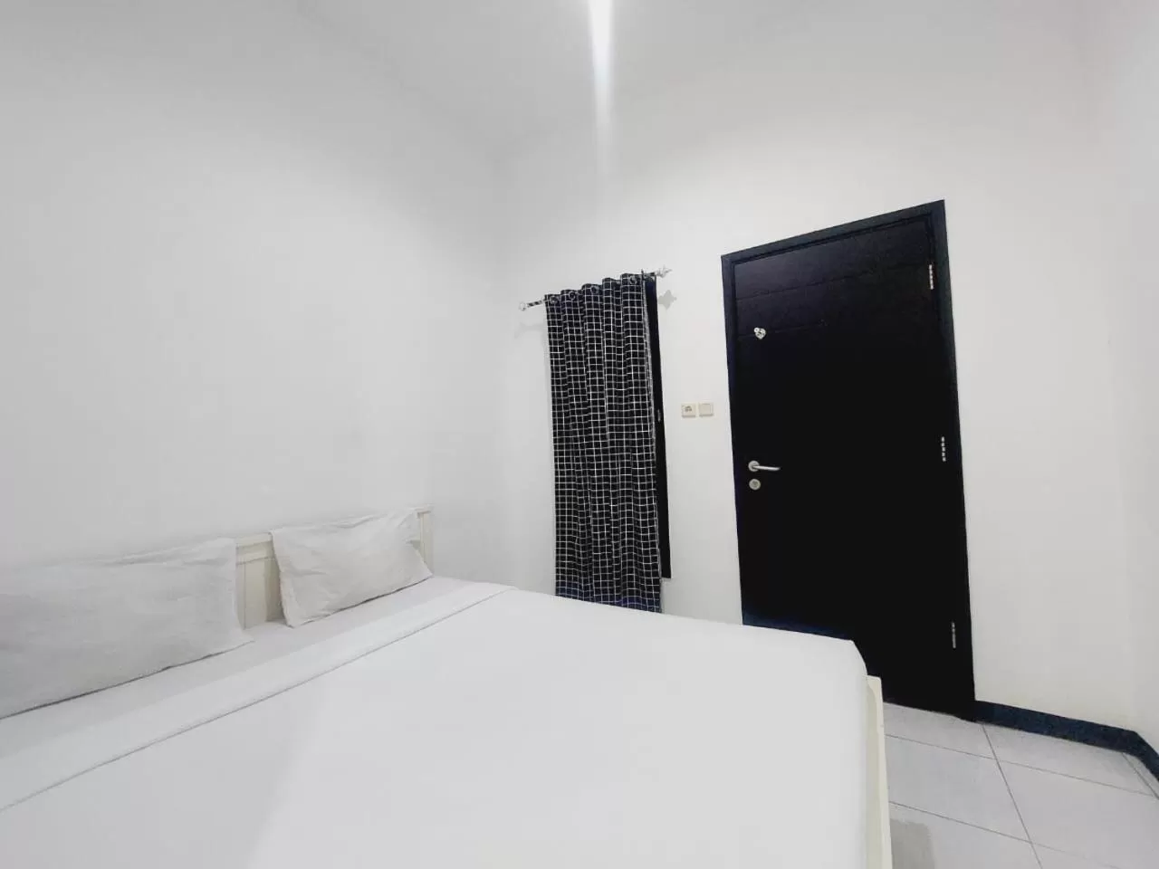 Bed in COZY STAY KUPANG