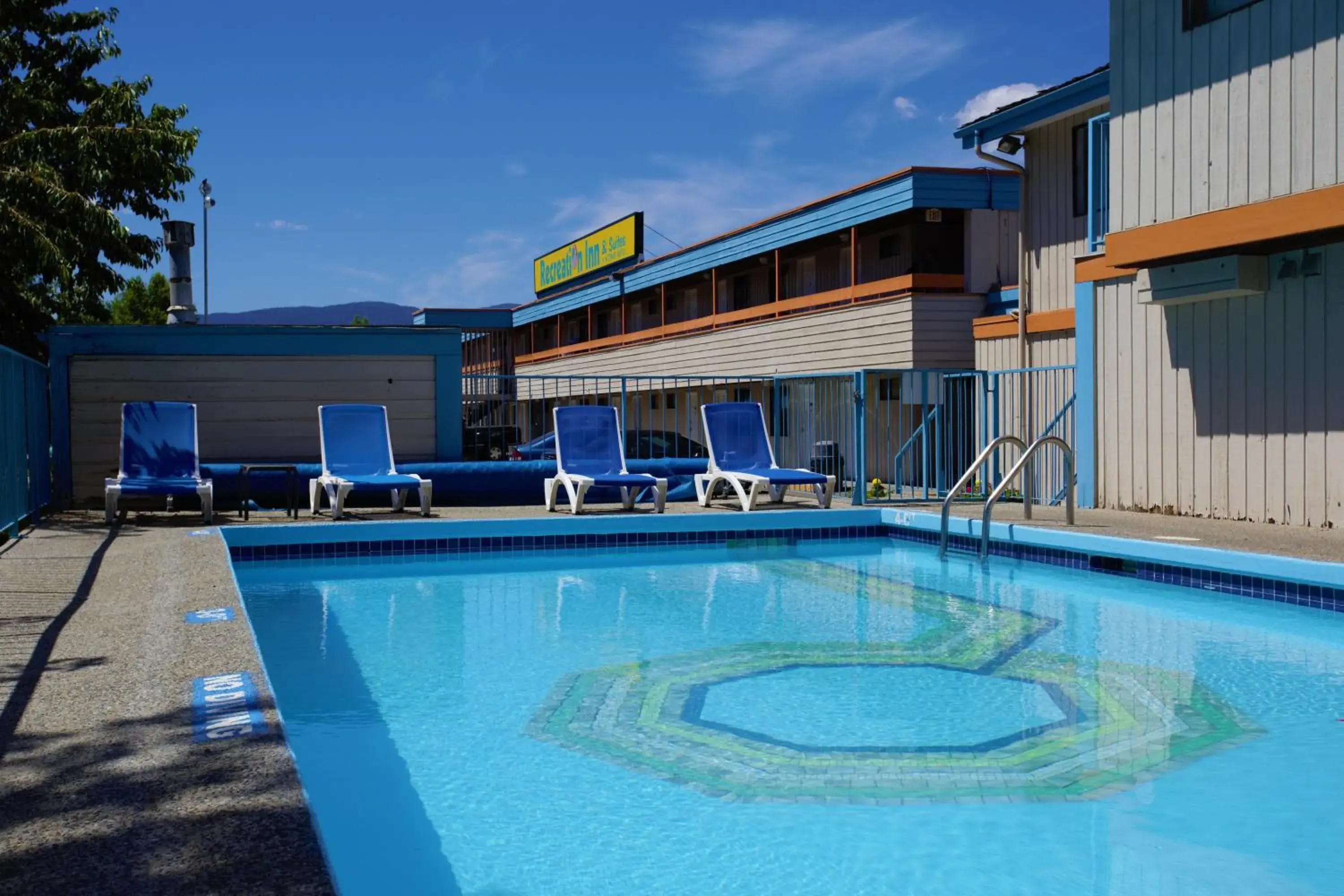 Patio, Swimming Pool in Recreation Inn and Suites