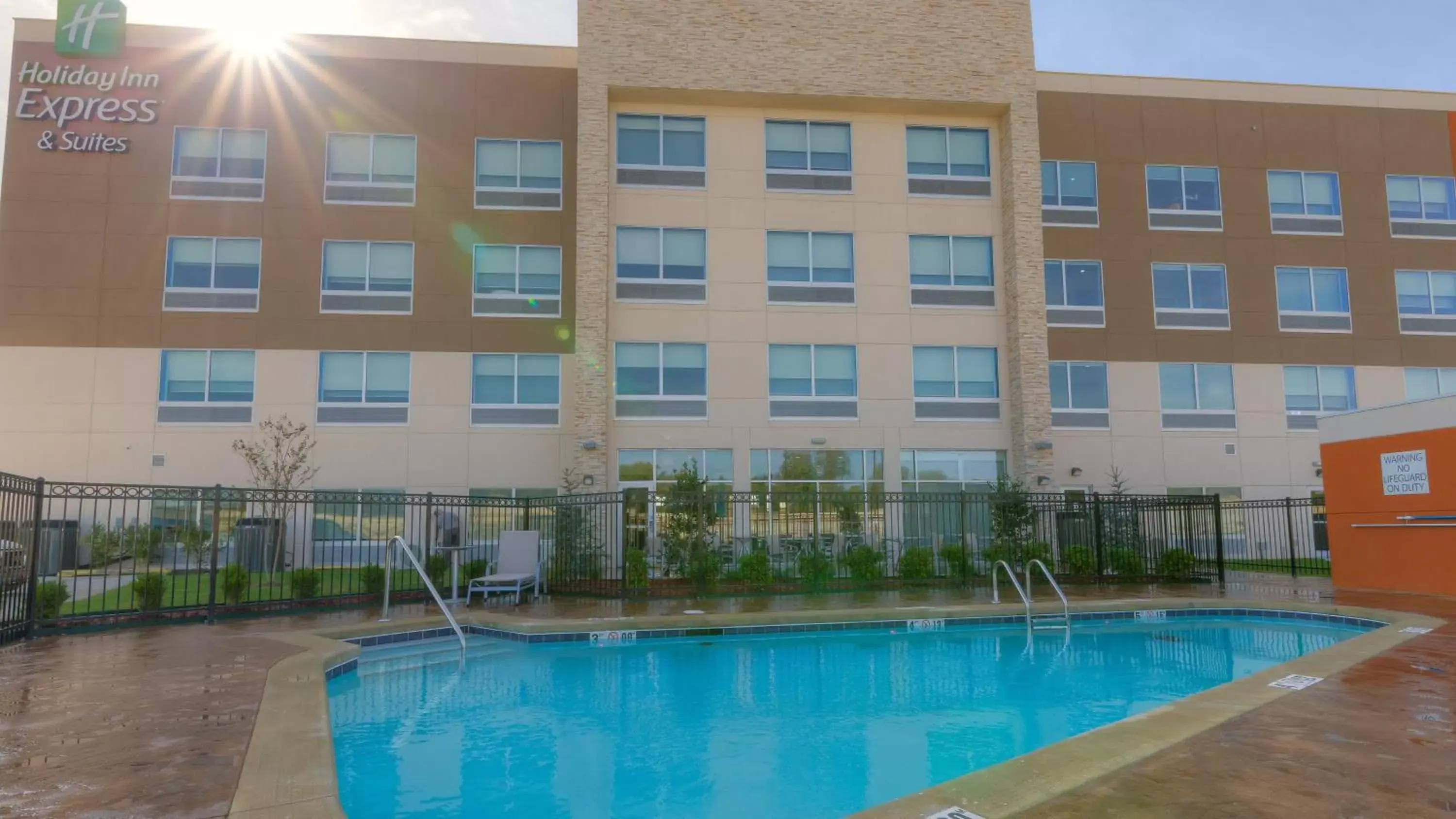Swimming Pool in Holiday Inn Express & Suites Tulsa Midtown, an IHG Hotel