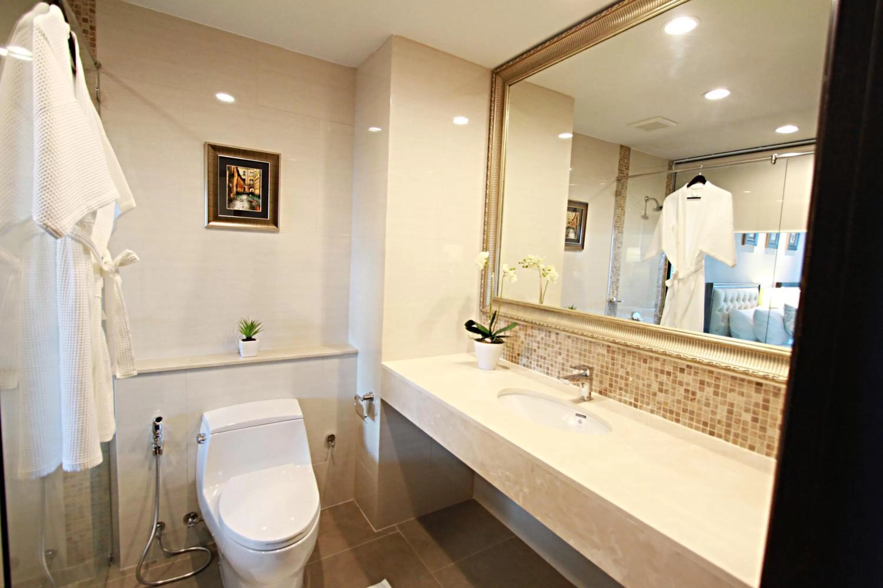 Bathroom in SN Plus Hotel - SHA Plus