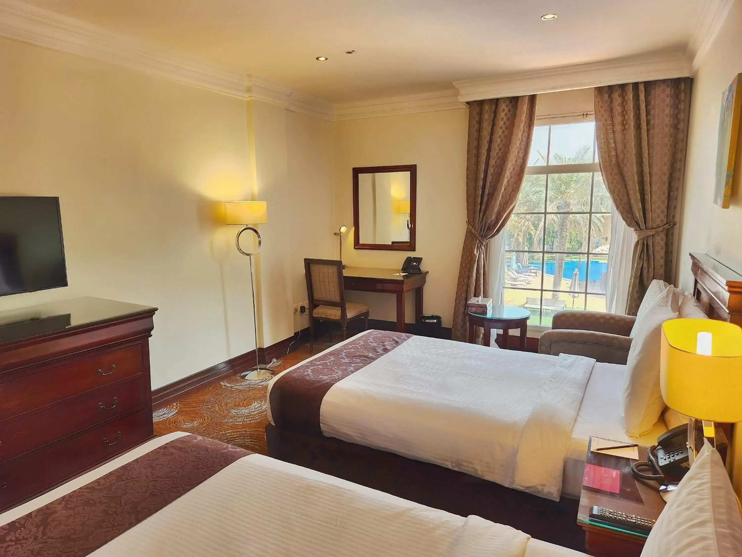 Property building, Bed in Mövenpick Hotel Kuwait Property building, Bed in Mövenpick Hotel Kuwait