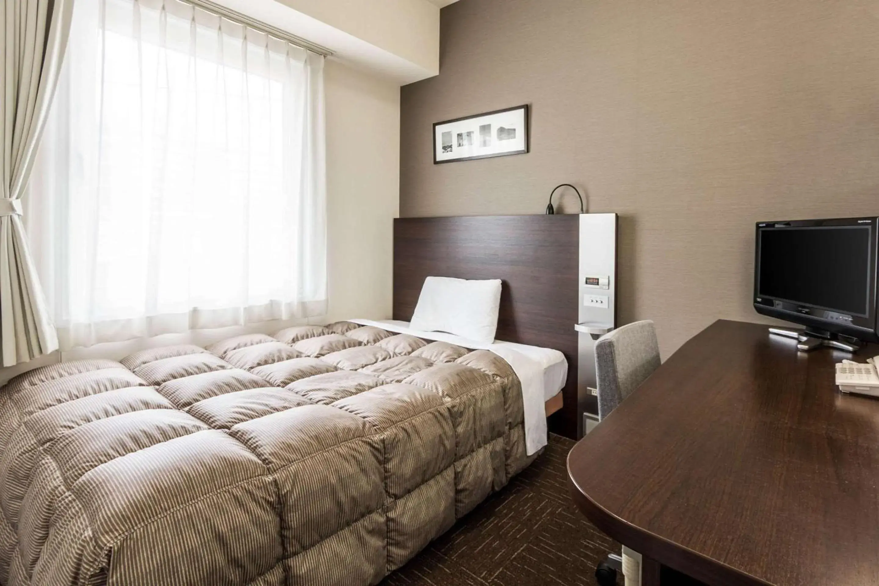 Photo of the whole room, Bed in Comfort Hotel Naha Prefectural Office