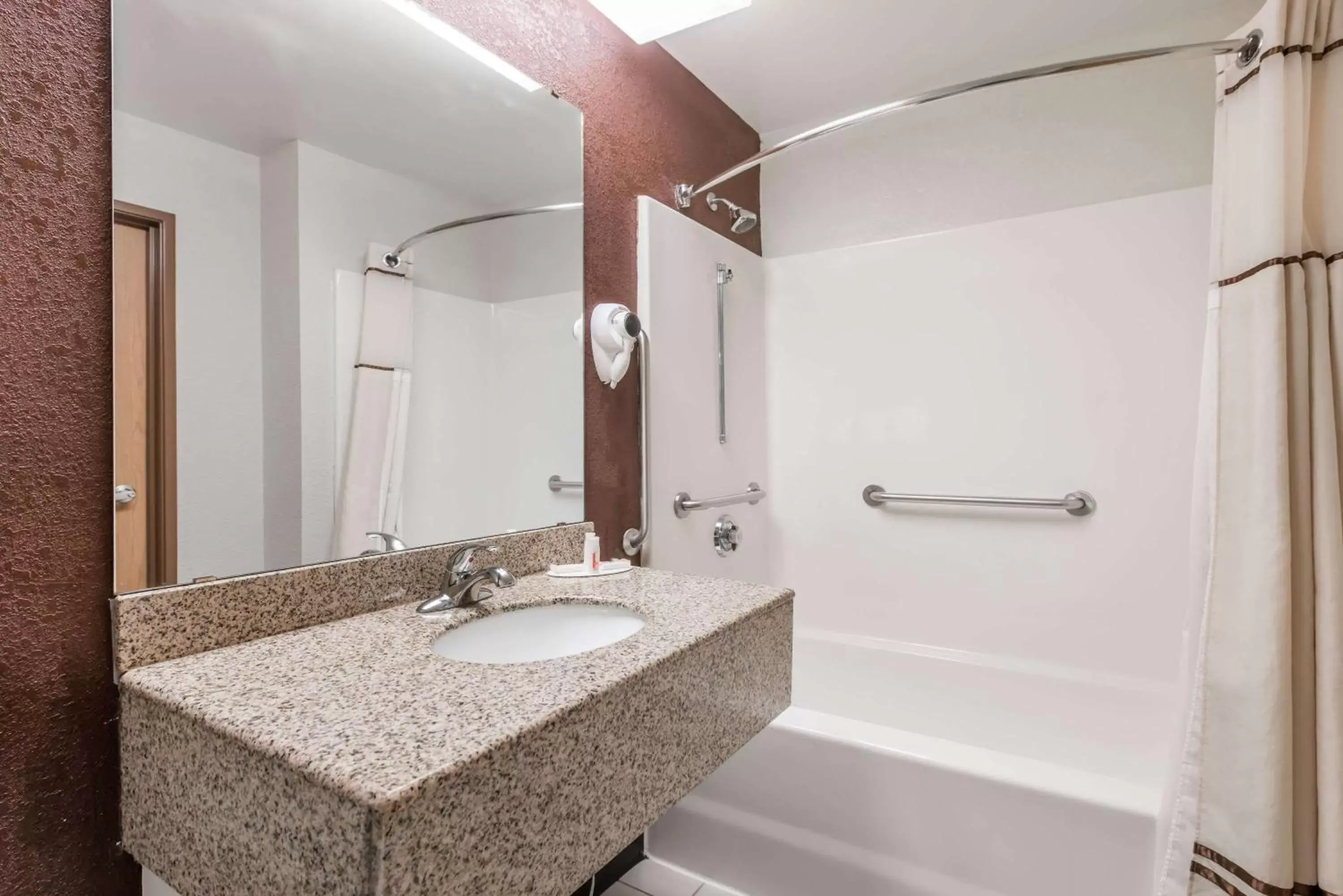 Bathroom in Days Inn & Suites by Wyndham Casey