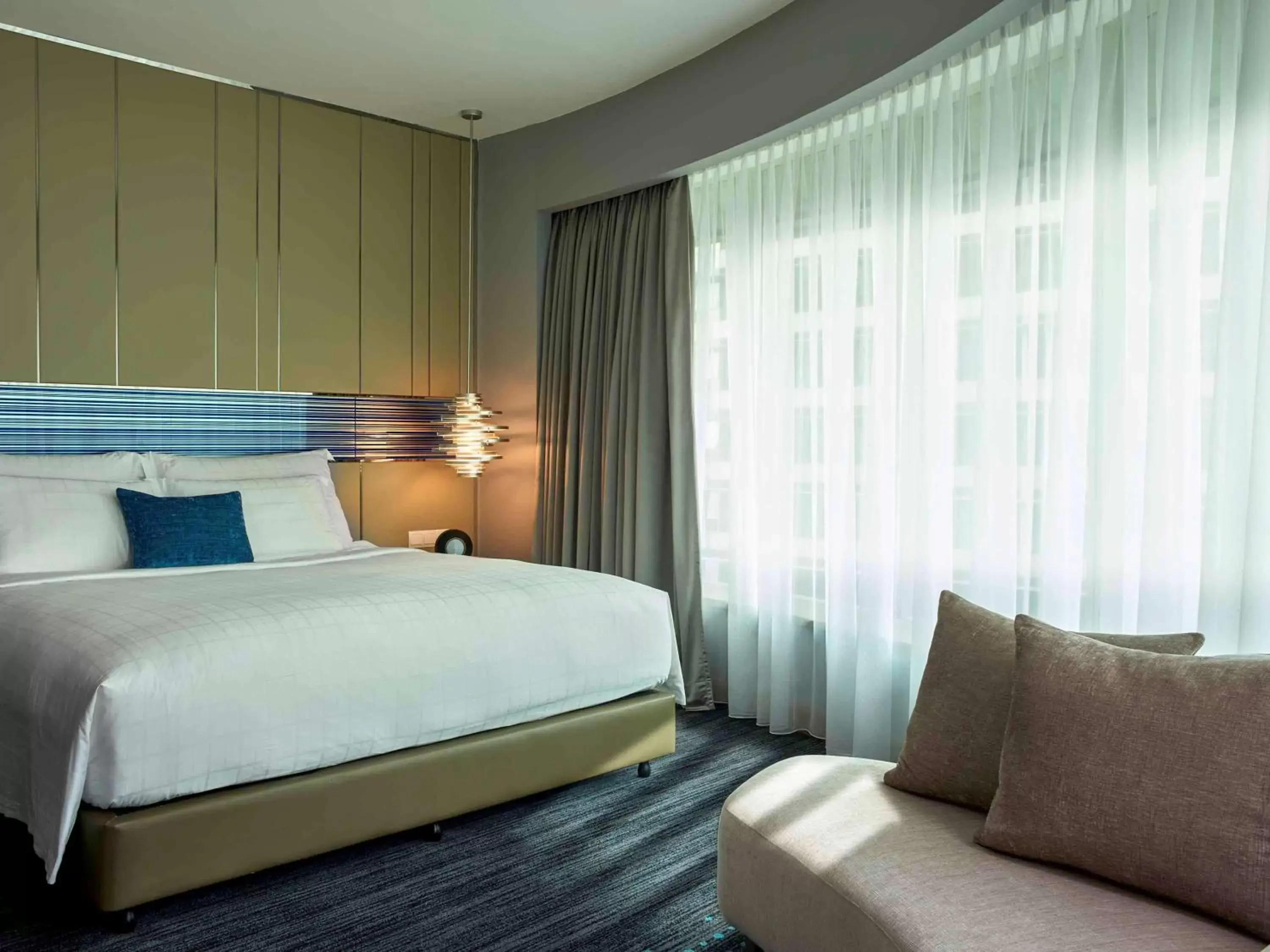 Photo of the whole room, Bed in Pullman Kuala Lumpur City Centre Hotel & Residences