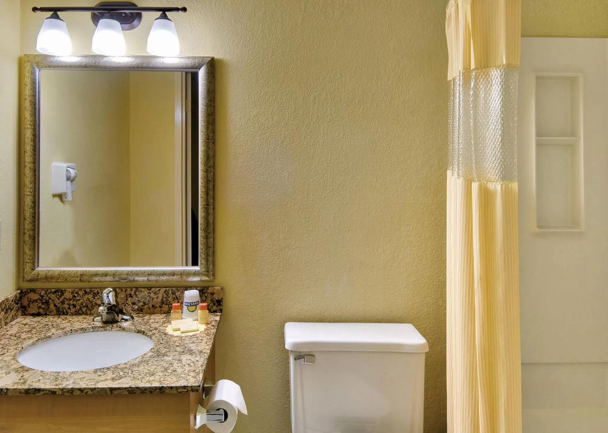 Bathroom in Days Inn by Wyndham East Windsor/Hightstown