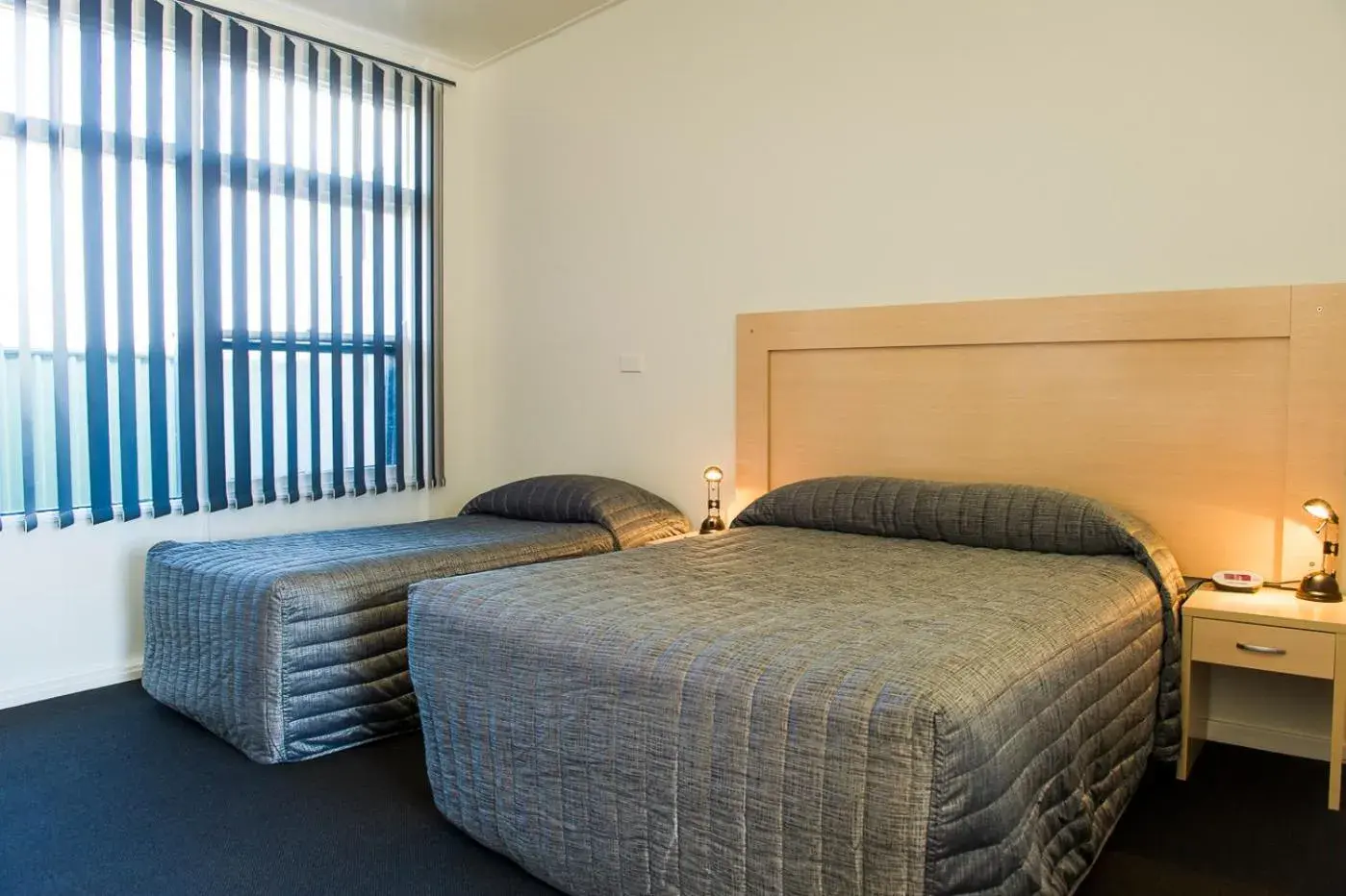 Photo of the whole room, Bed in Cherry Blossom Motor Inn