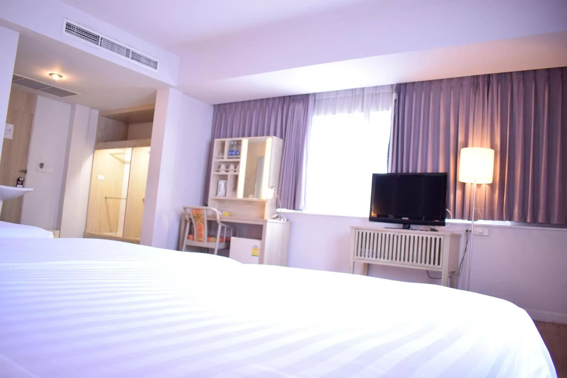 Bed in Trang Hotel Bangkok - SHA Plus