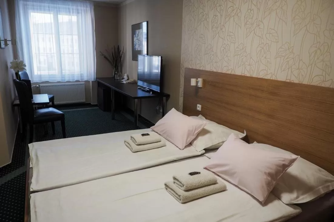 Bed in Hotel Vacek Pod Věží