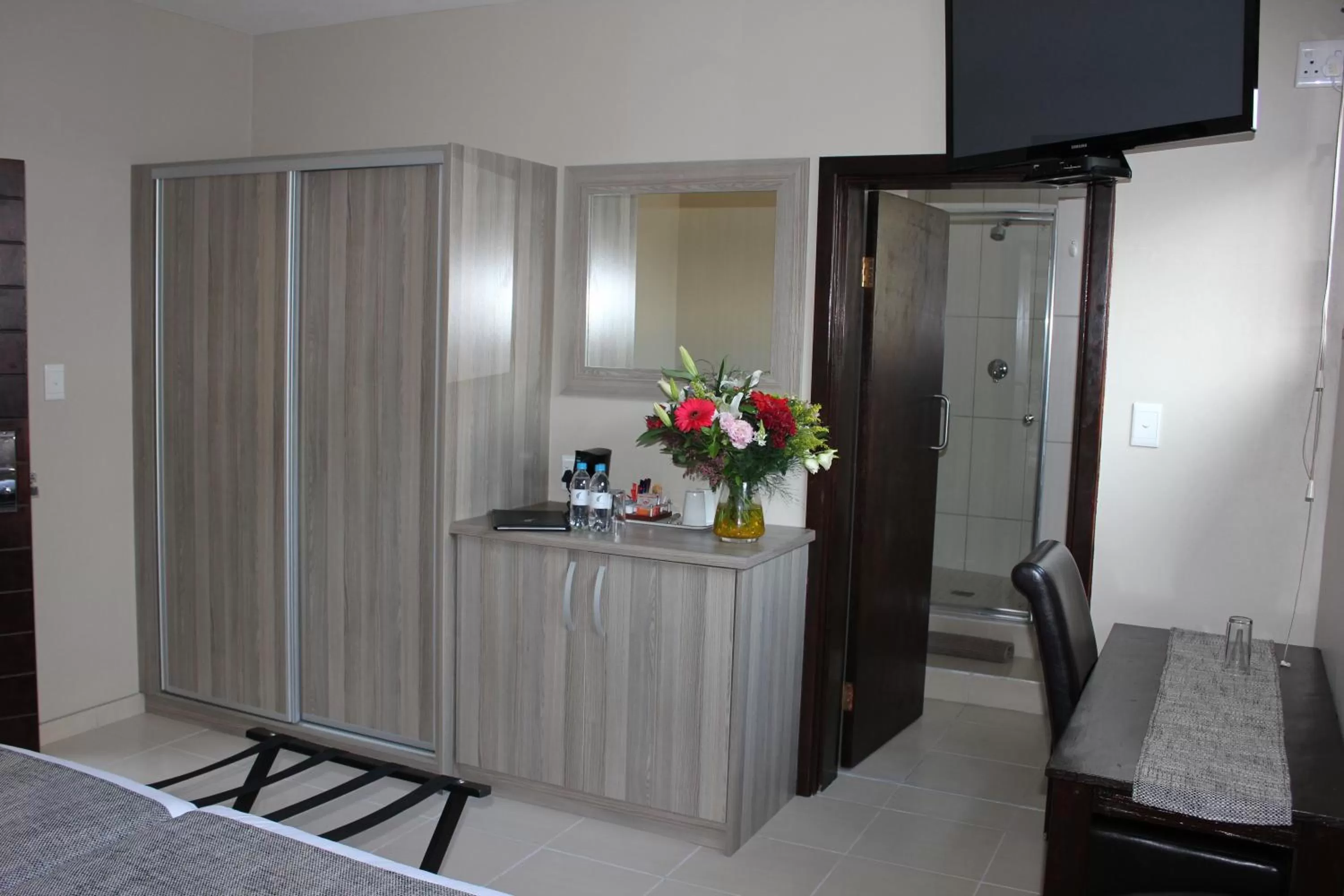 Bedroom, TV/Entertainment Center in Prost Hotel Swakopmund Namibia