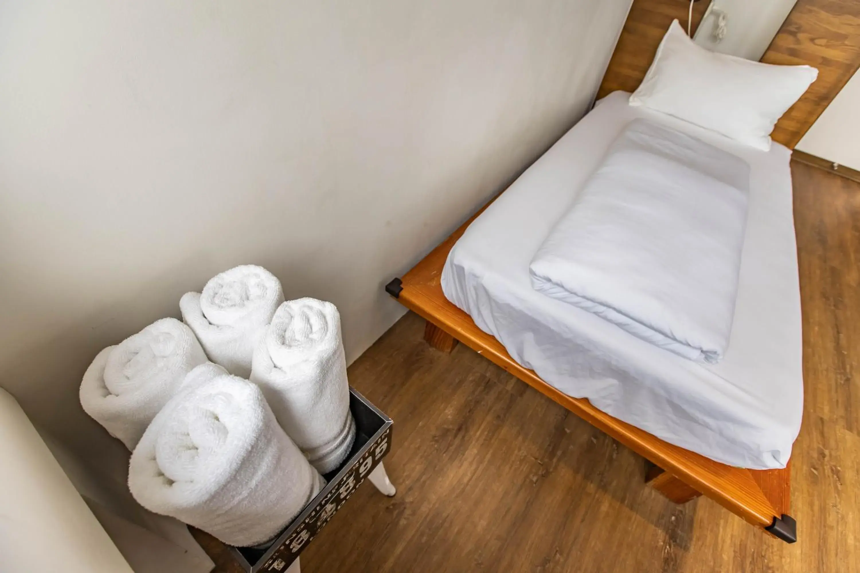 towels, Bed in Mini Voyage Hostel