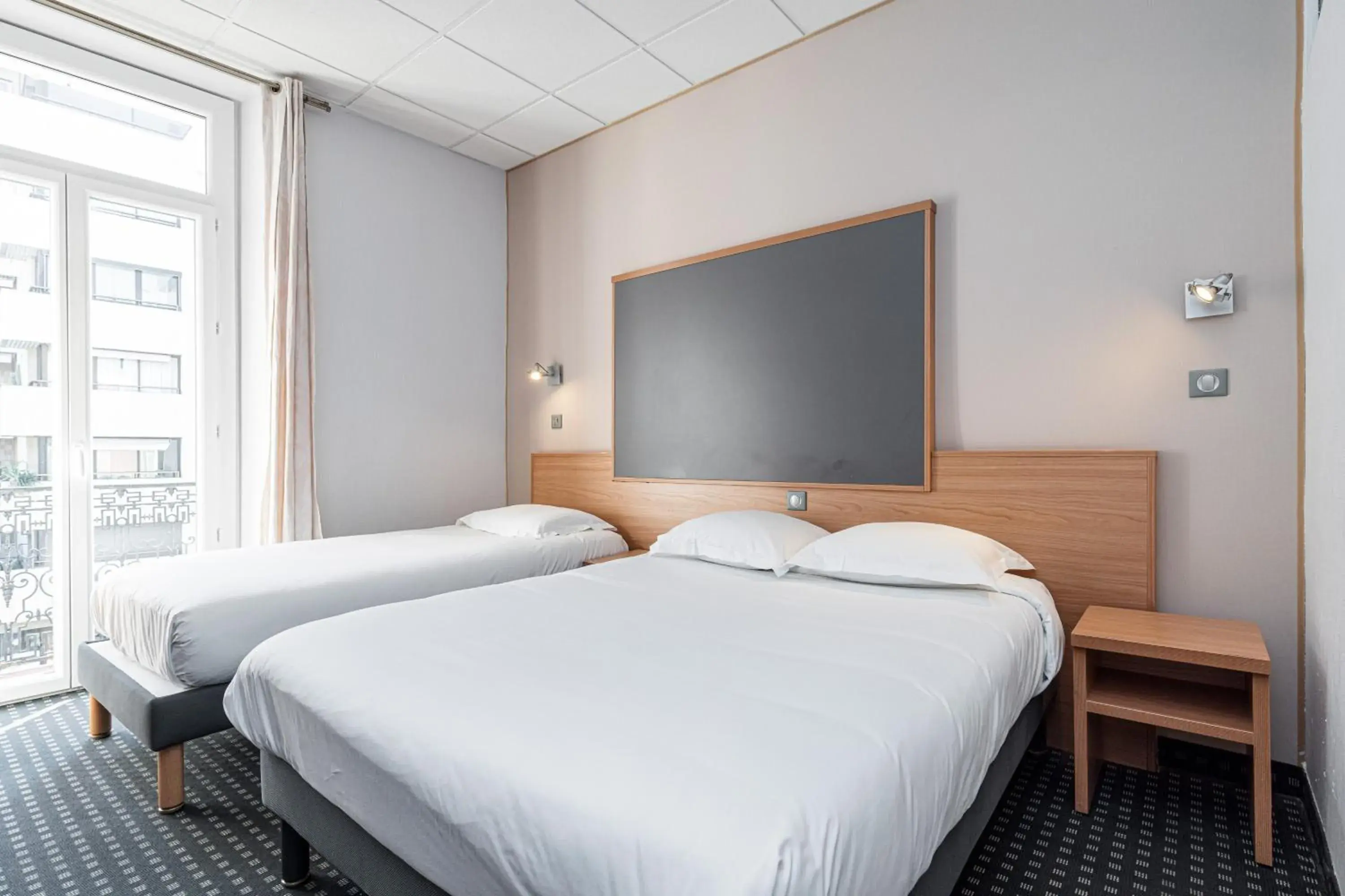 Bed in Modern Waikiki Hotel