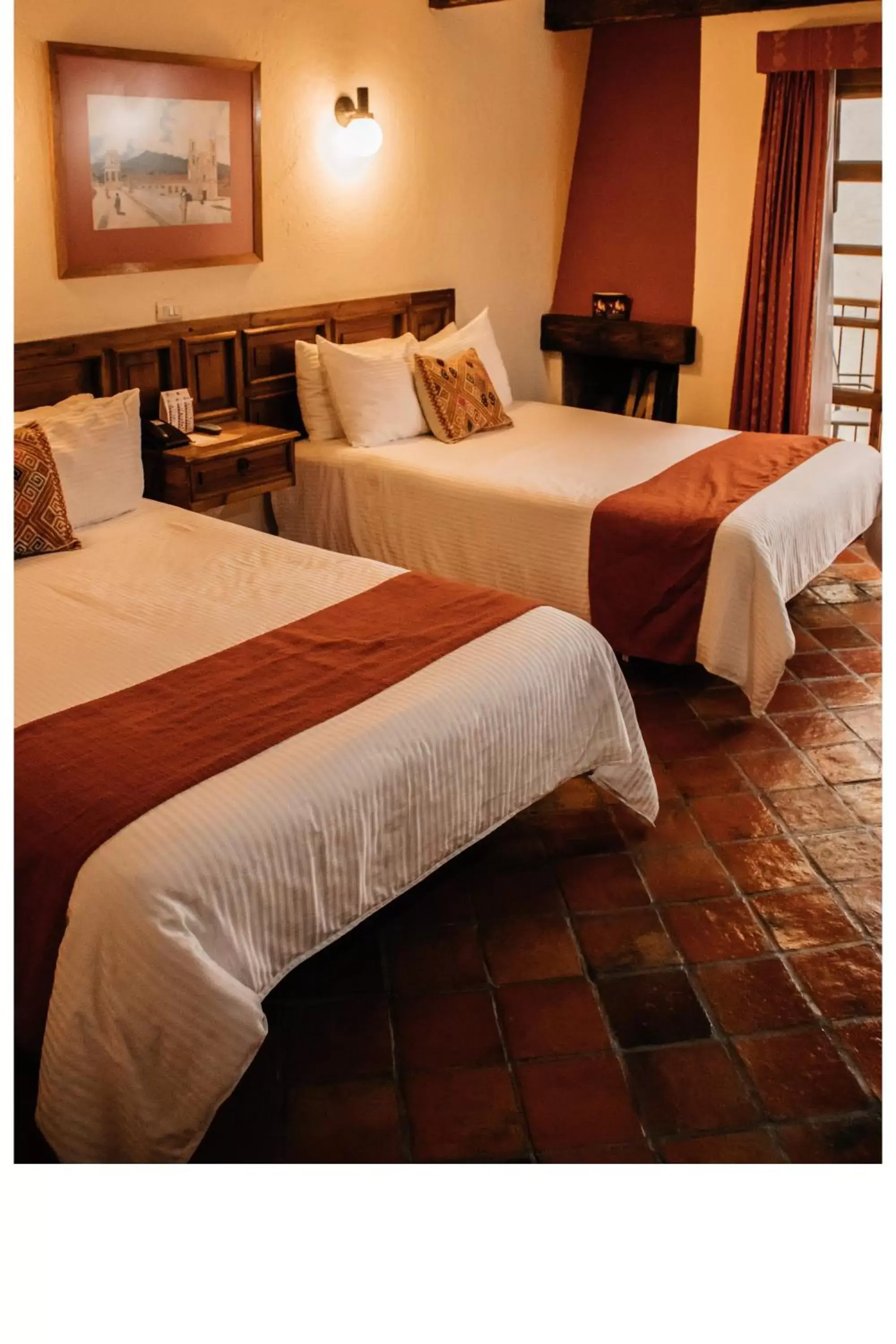 Bed in Hotel Diego de Mazariegos