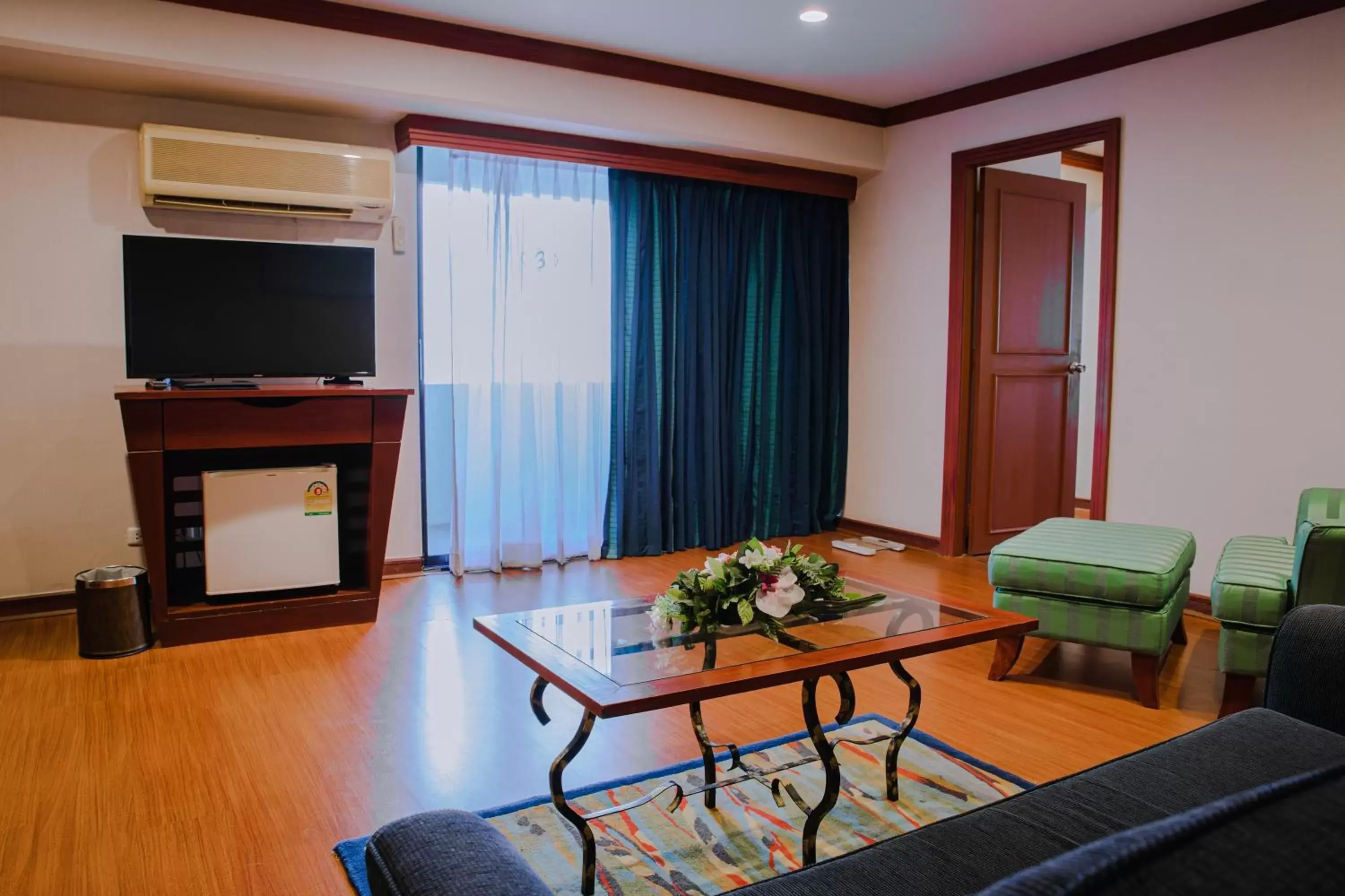 Living room, TV/Entertainment Center in Baiyoke Suite Hotel