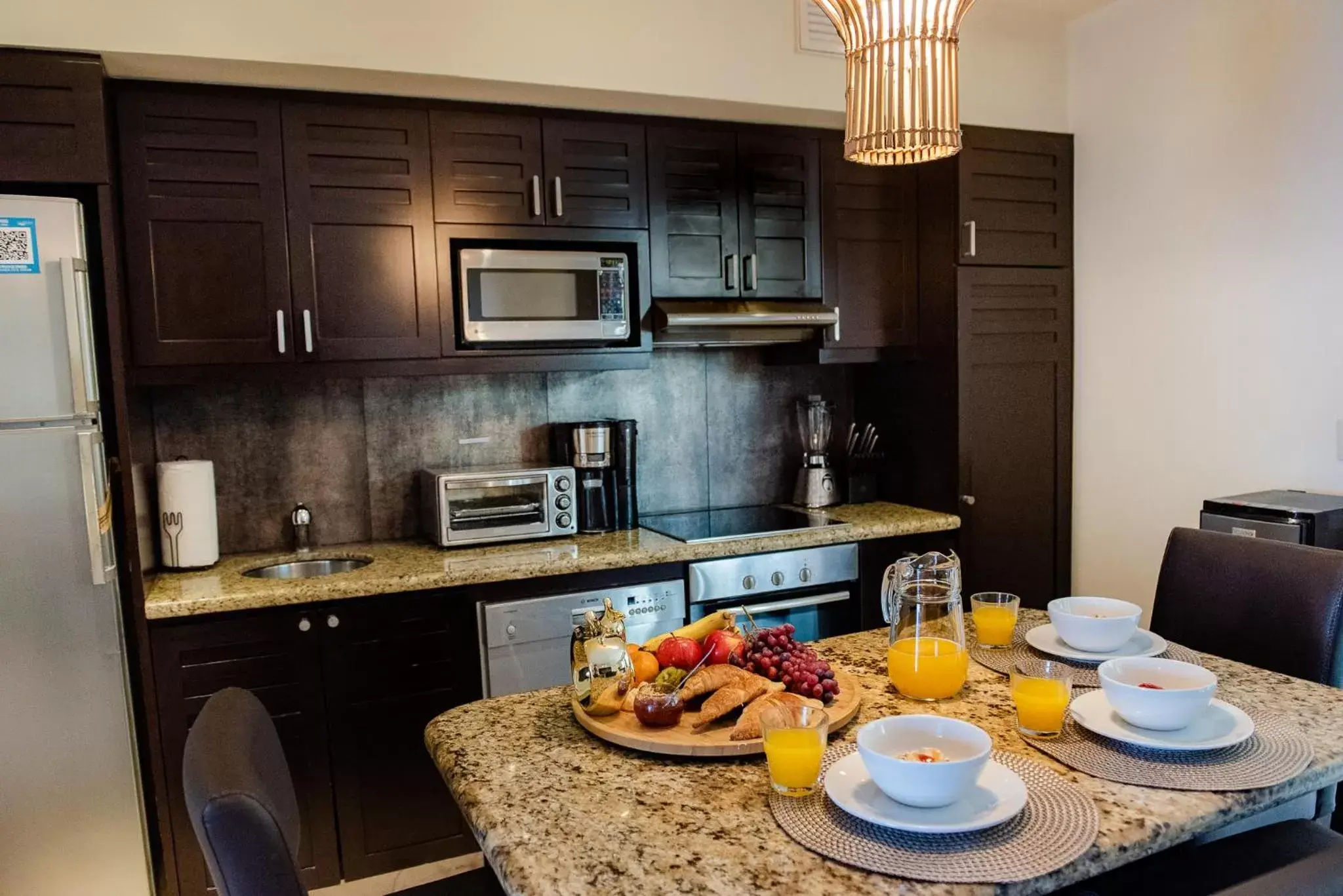 Coffee/tea facilities, Kitchen/Kitchenette in El Taj Oceanfront and Beachside Condo Hotel