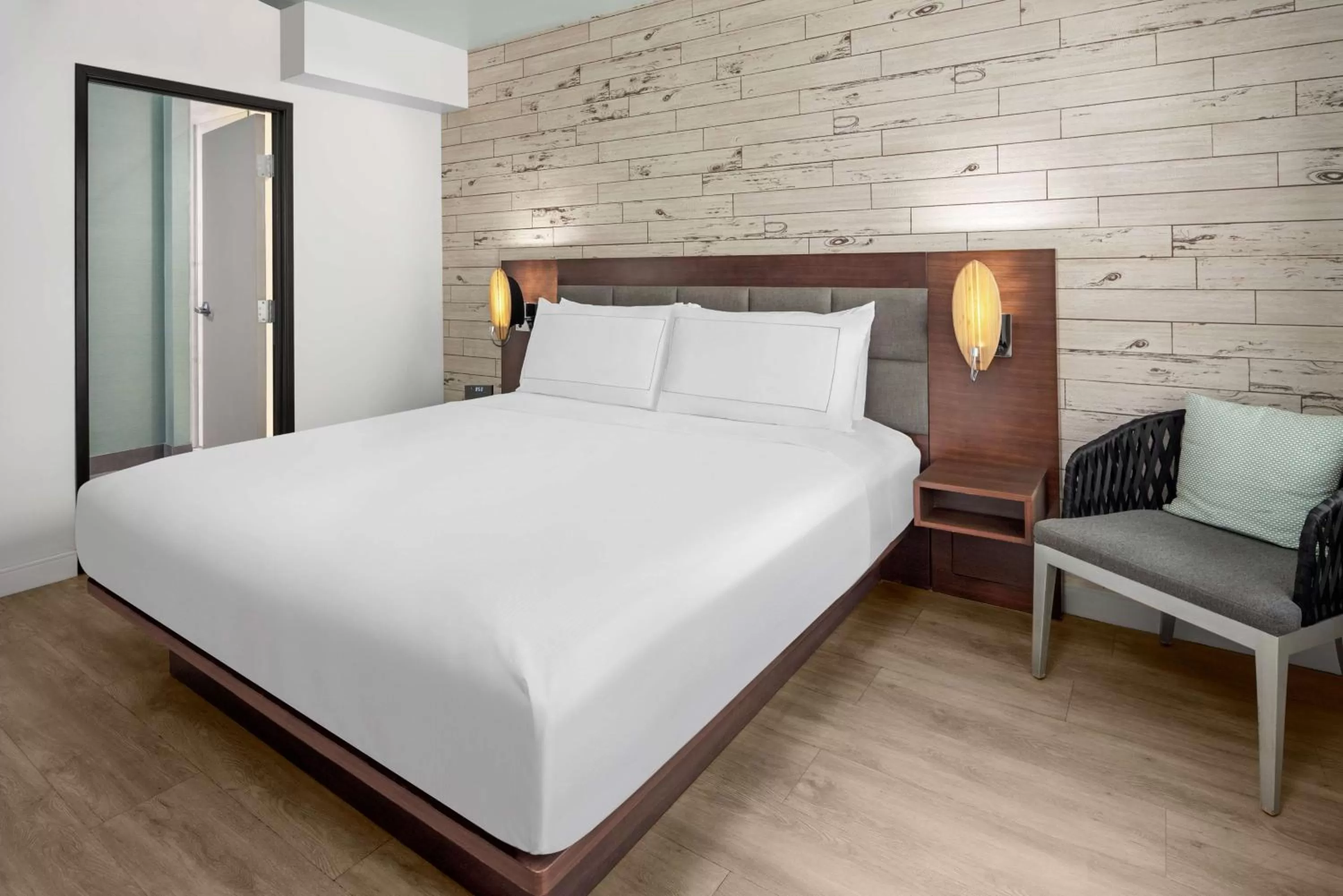 Bed in The Fin Hotel, Tapestry Collection by Hilton