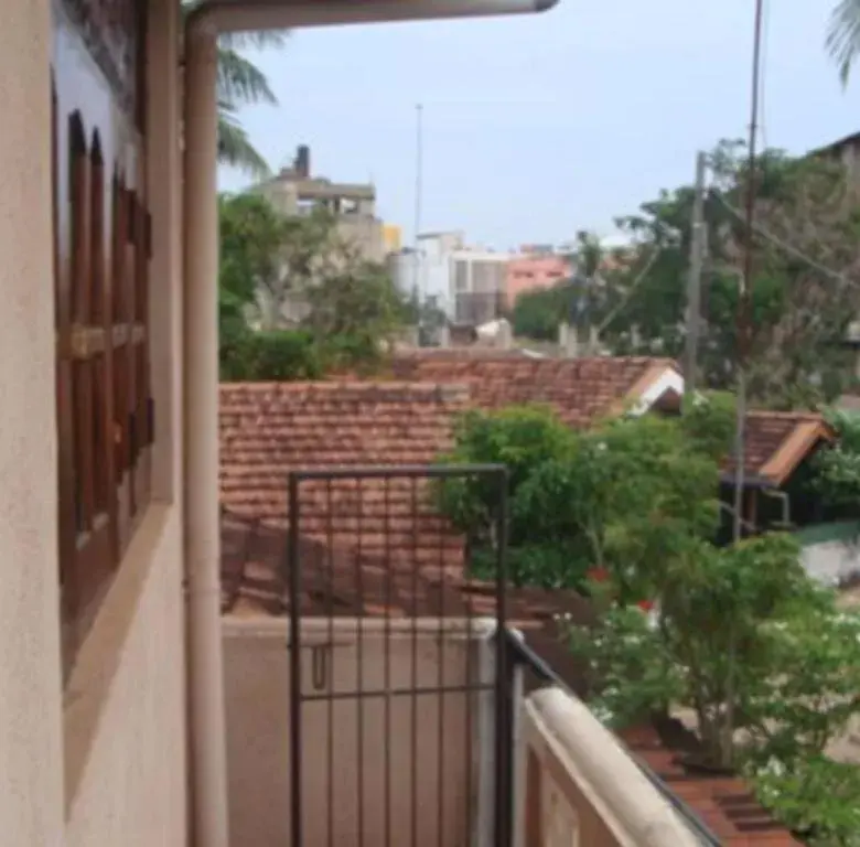 Property building, Balcony/Terrace in Randi Homestay