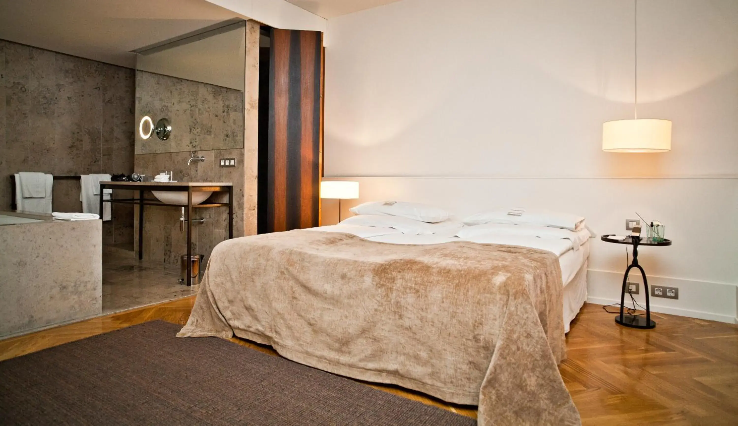 Bed in CORTIINA Hotel