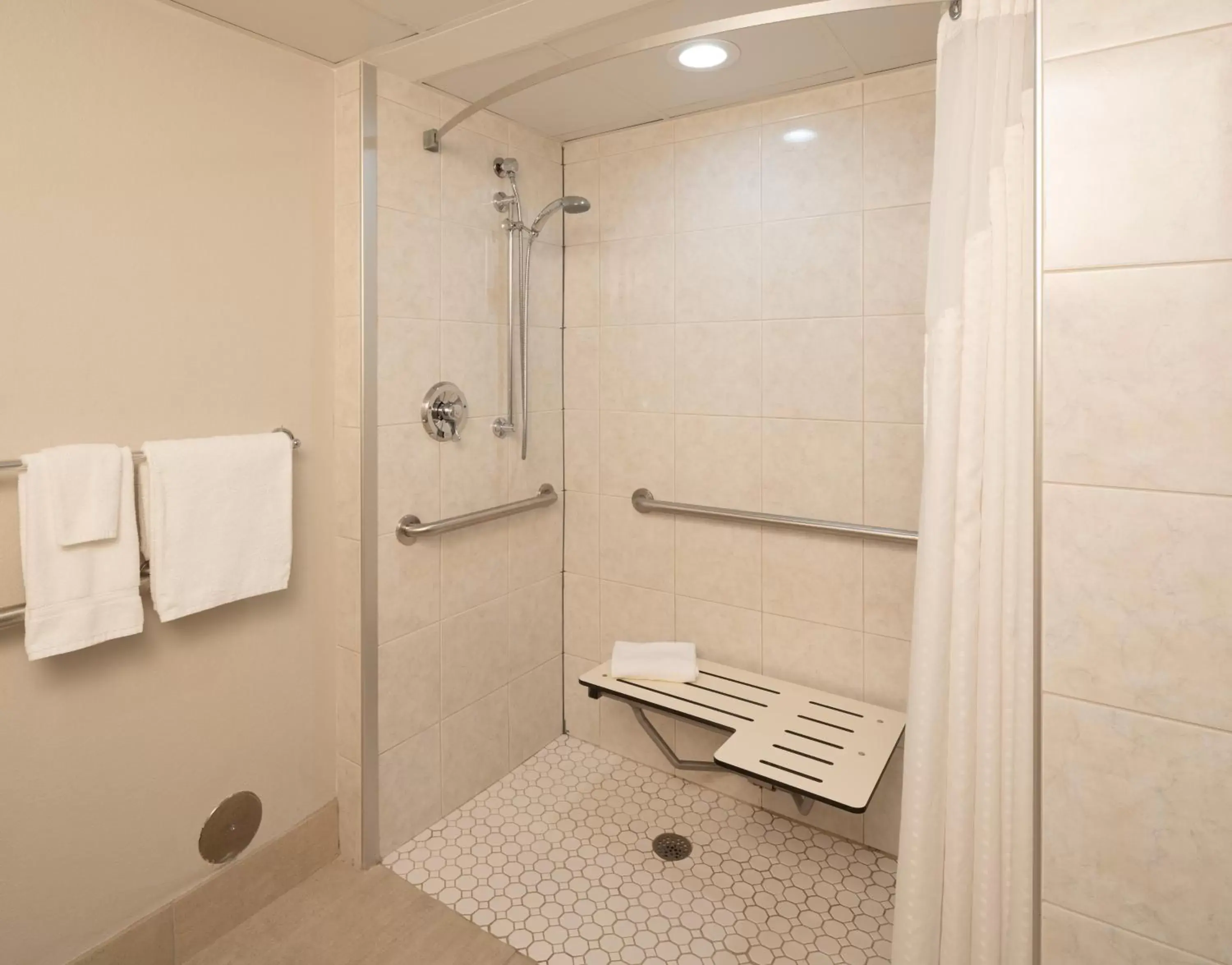 Bathroom in Holiday Inn Express Rochester - Greece, an IHG Hotel
