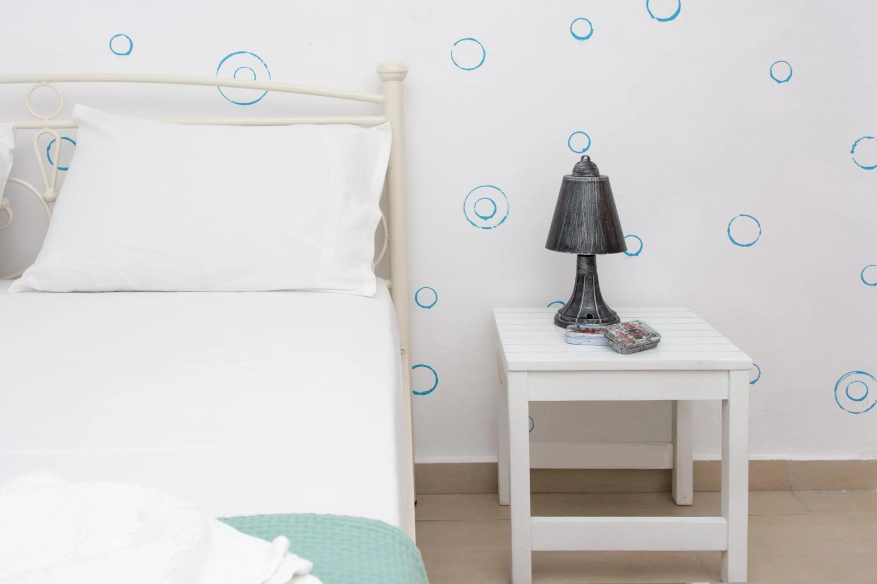 Bed, Seating Area in Depis Place and Apartments