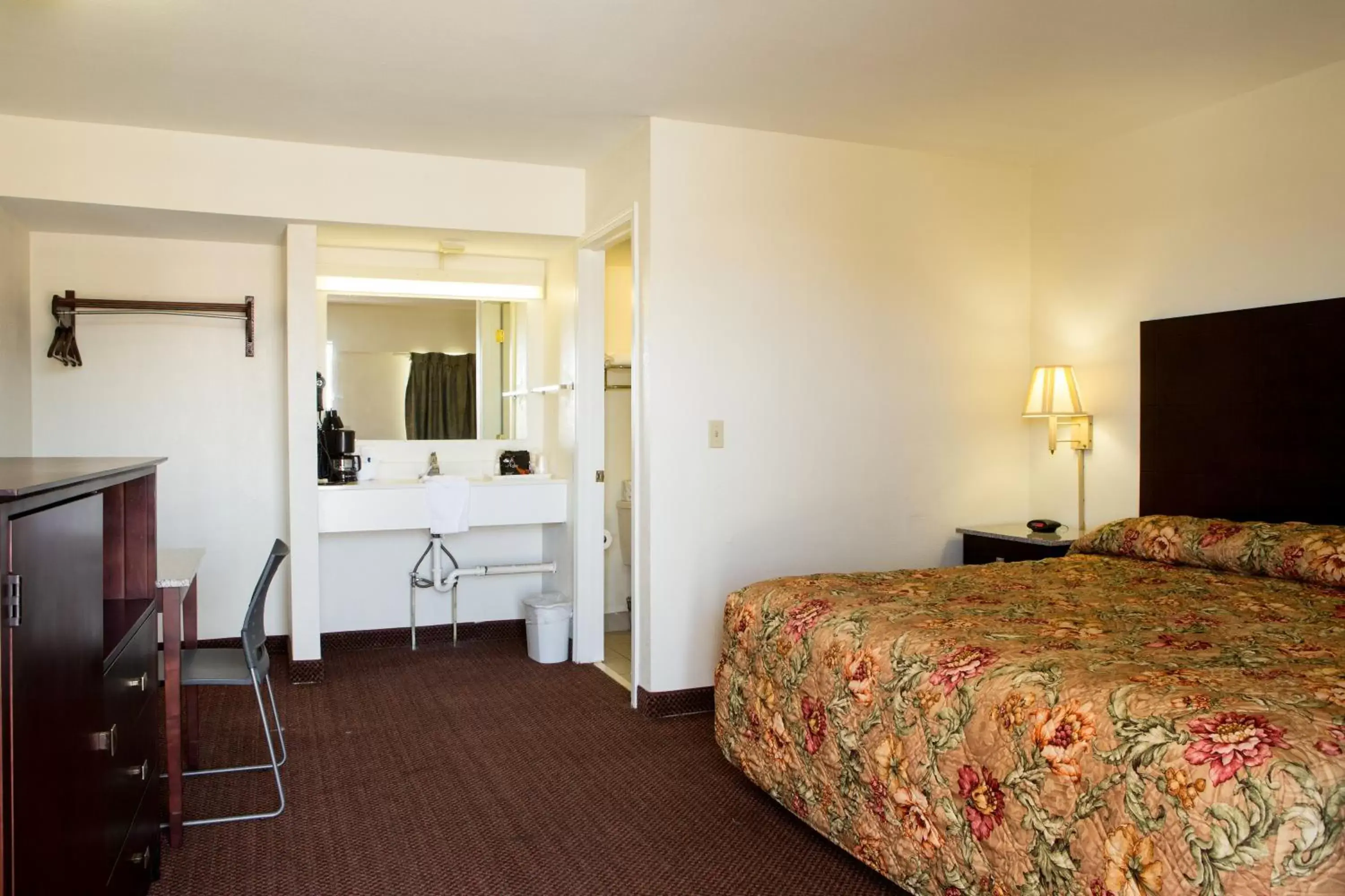 Bed in Sands Inn & Suites
