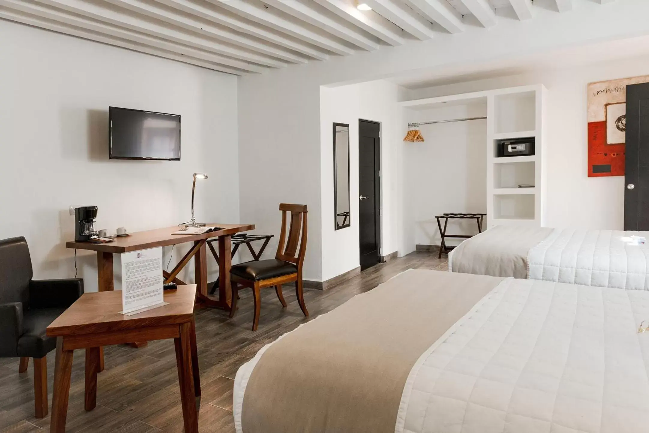 Bedroom, TV/Entertainment Center in Hotel La Morada