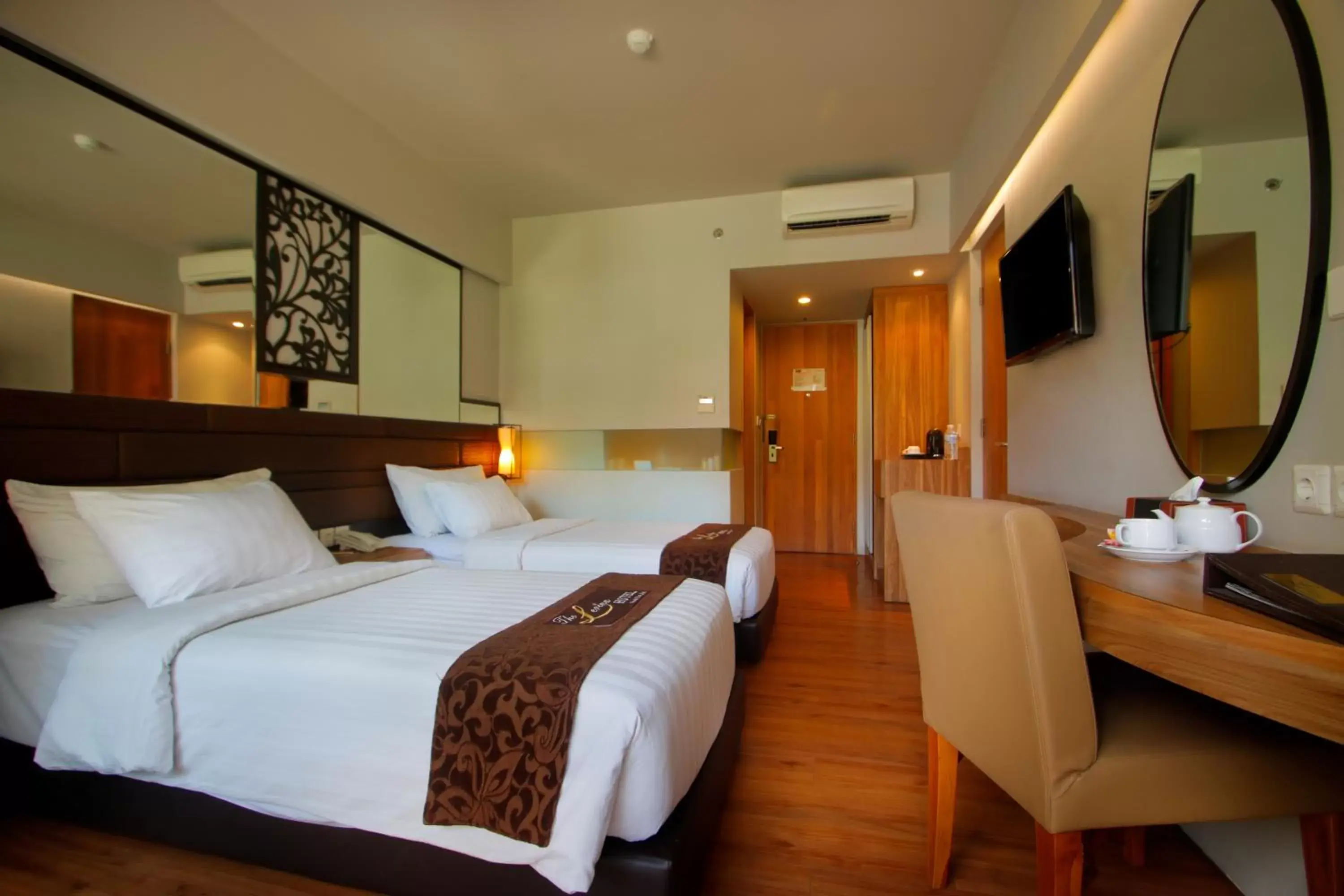 Bed in The Lerina Hotel Nusa Dua