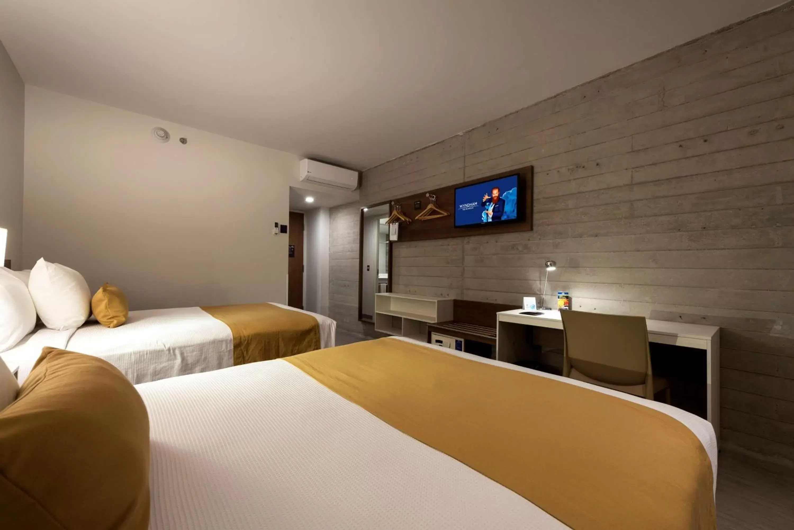 TV and multimedia, Bed in Microtel Inn & Suites by Wyndham San Luis Potosi