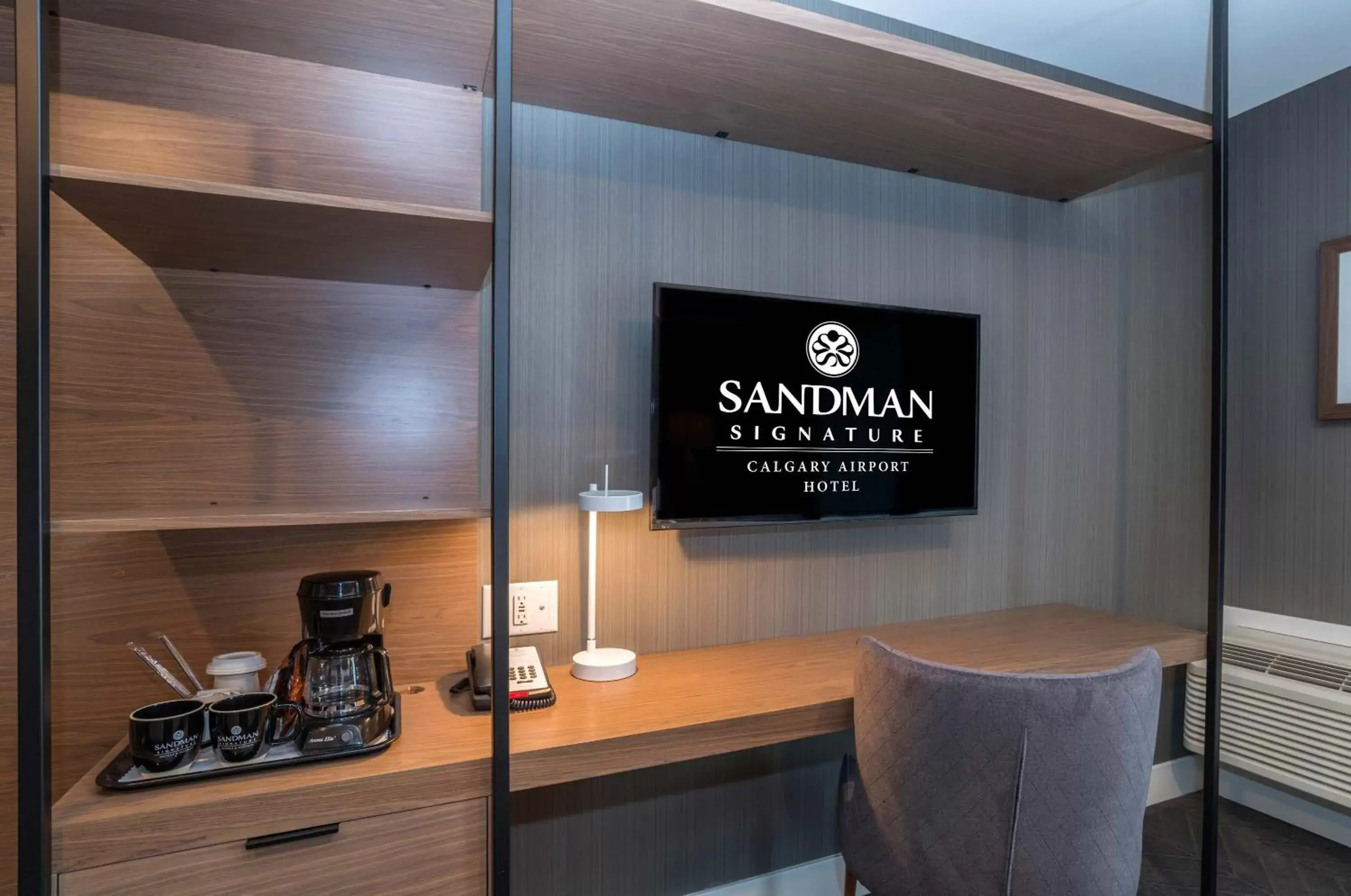 Photo of the whole room in Sandman Signature Calgary Airport Hotel