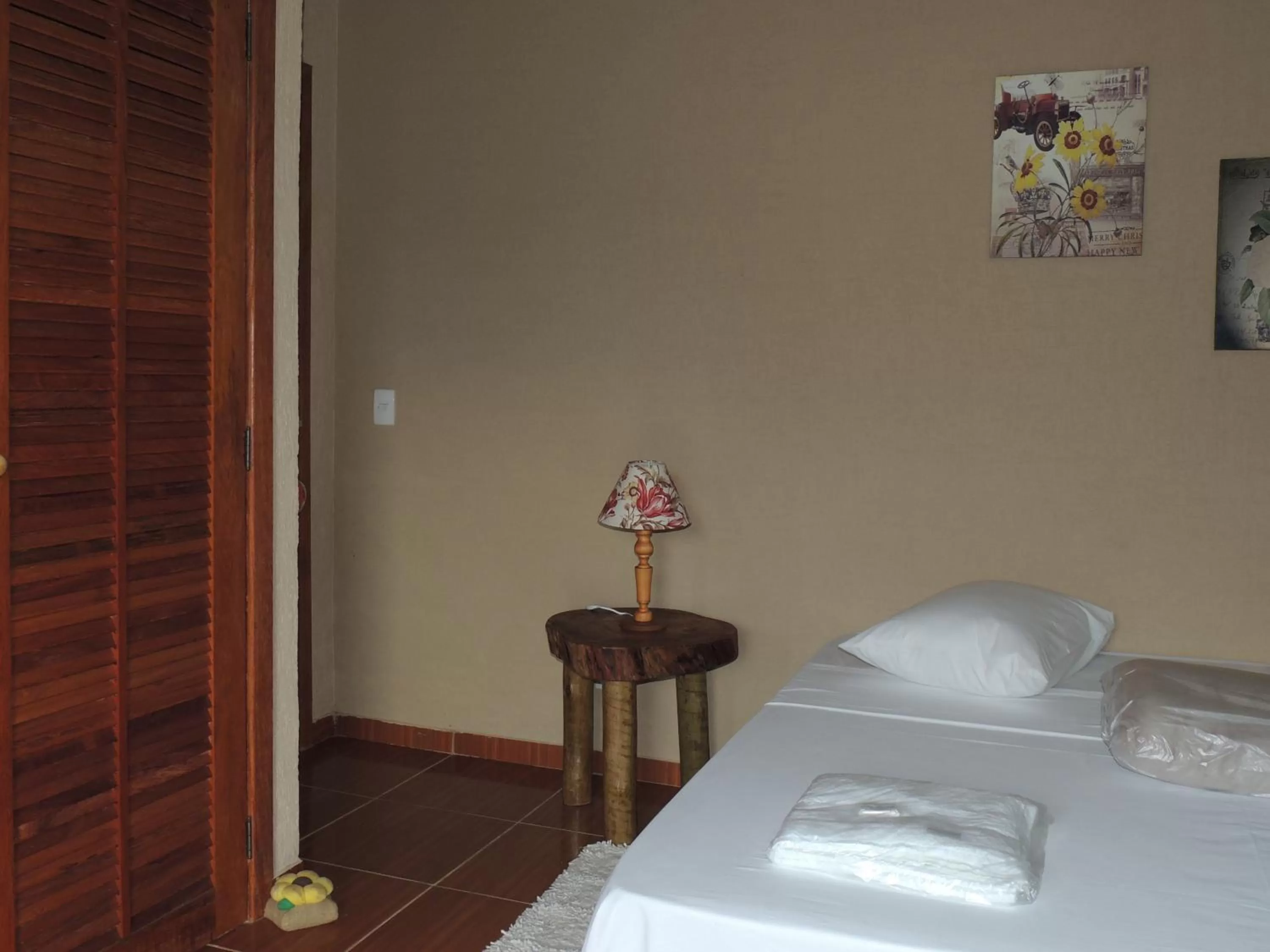 Photo of the whole room, Bed in Pousada R.N.C. Nosso Paraíso