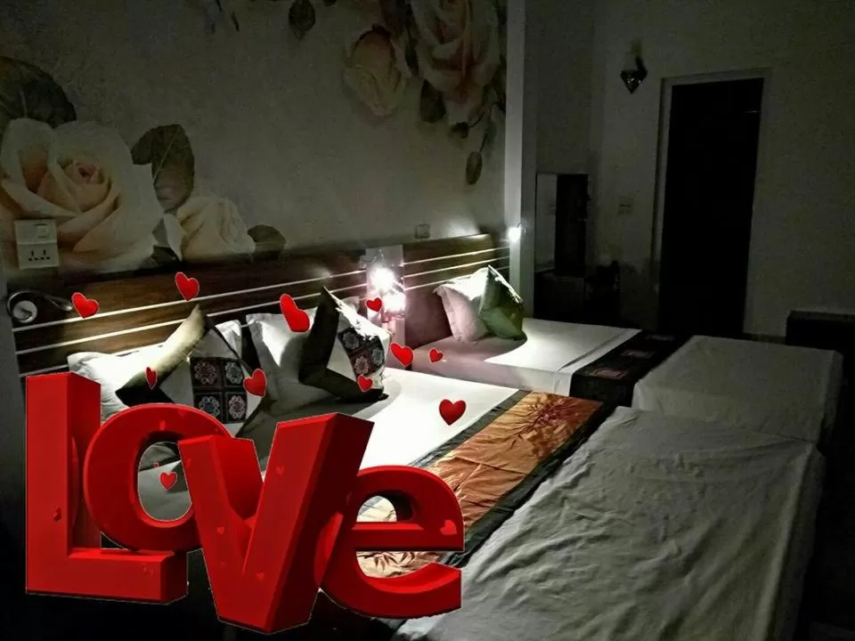 Bed in Friendly Home Hotel