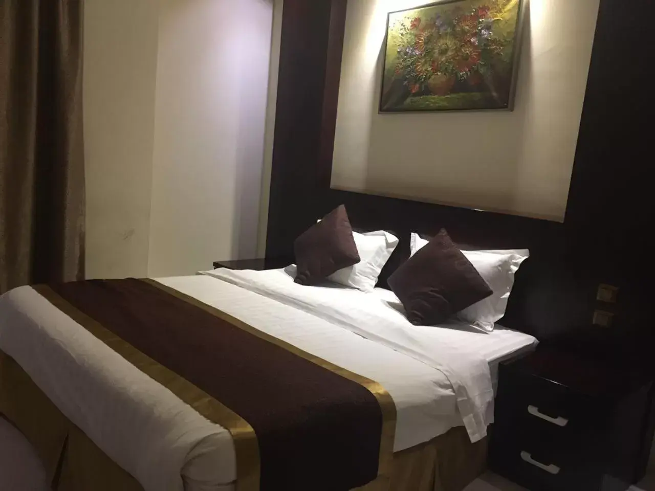 Bed in Taleen Al Nakheel Apartment Bed in Taleen Al Nakheel Apartment