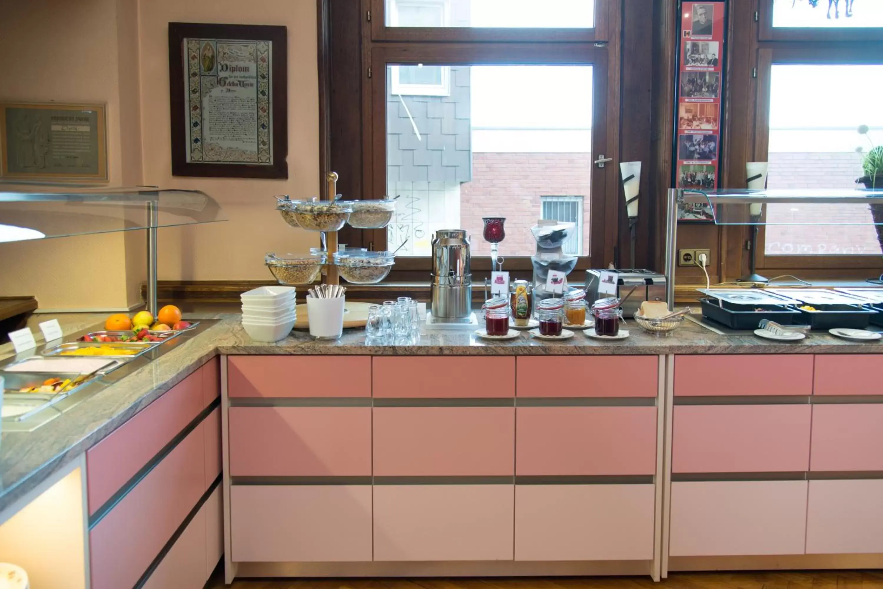 Buffet breakfast, Kitchen/Kitchenette in Trip Inn PostHotel Düren