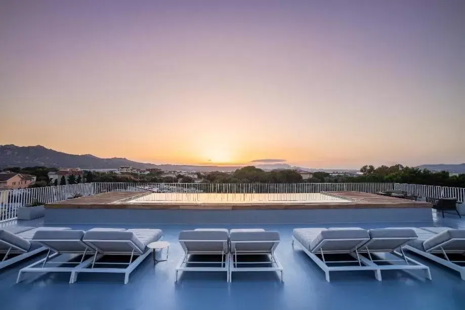 Swimming pool, Sunrise/Sunset in Felix Hotel Olbia