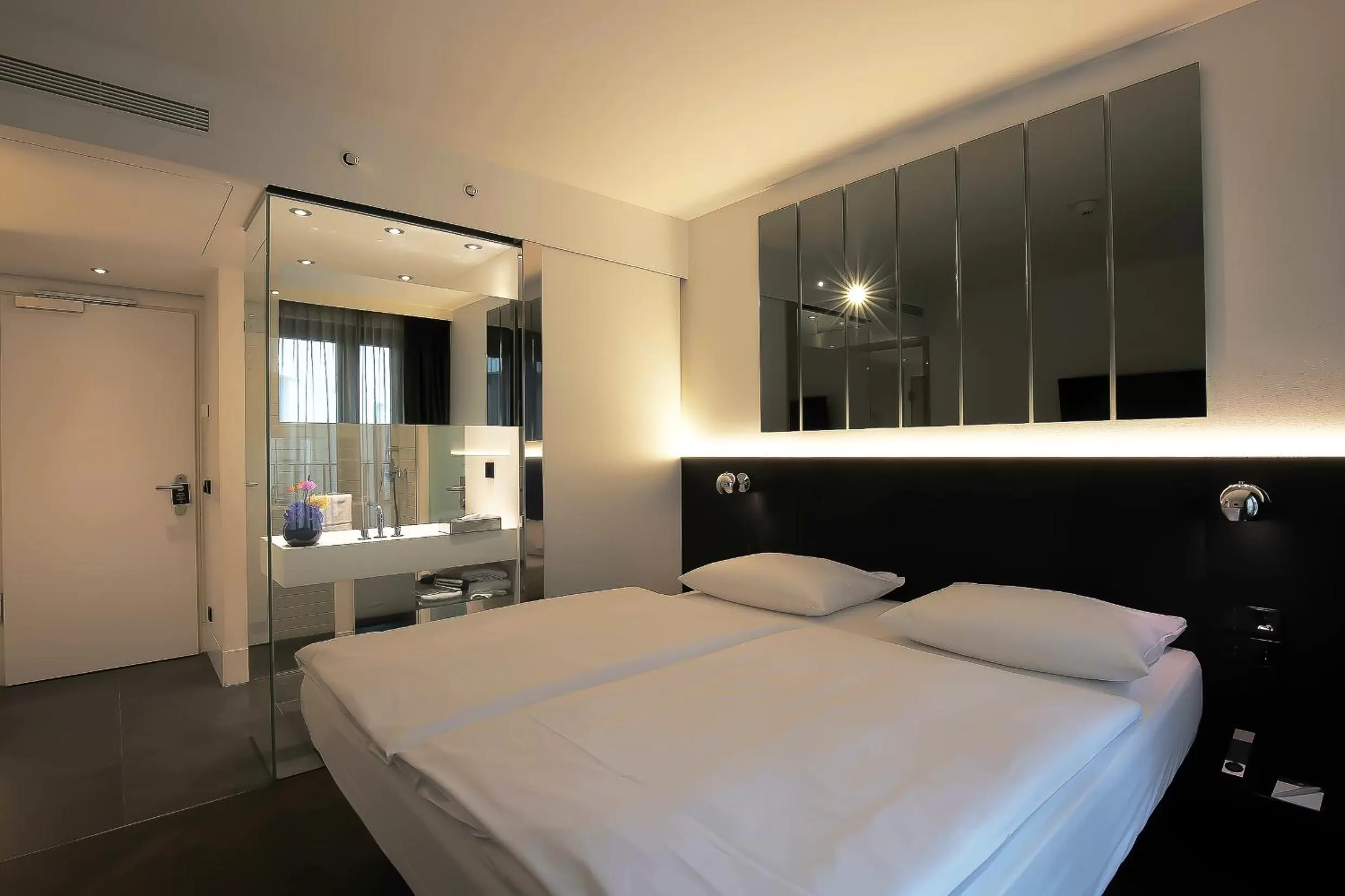 Photo of the whole room, Bed in Hotel AMANO Grand Central