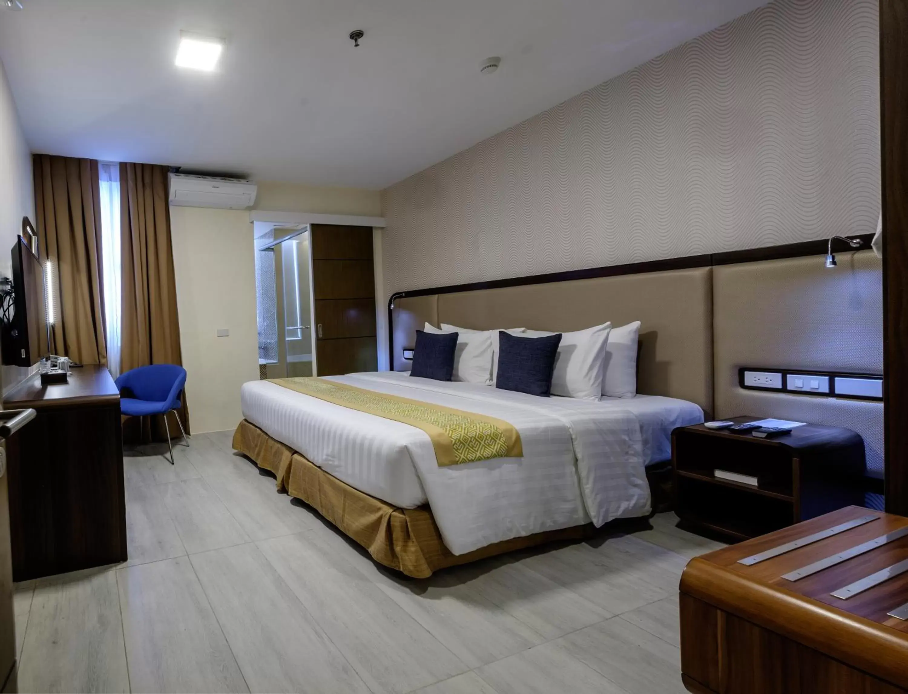 Bed in One Central Hotel & Suites