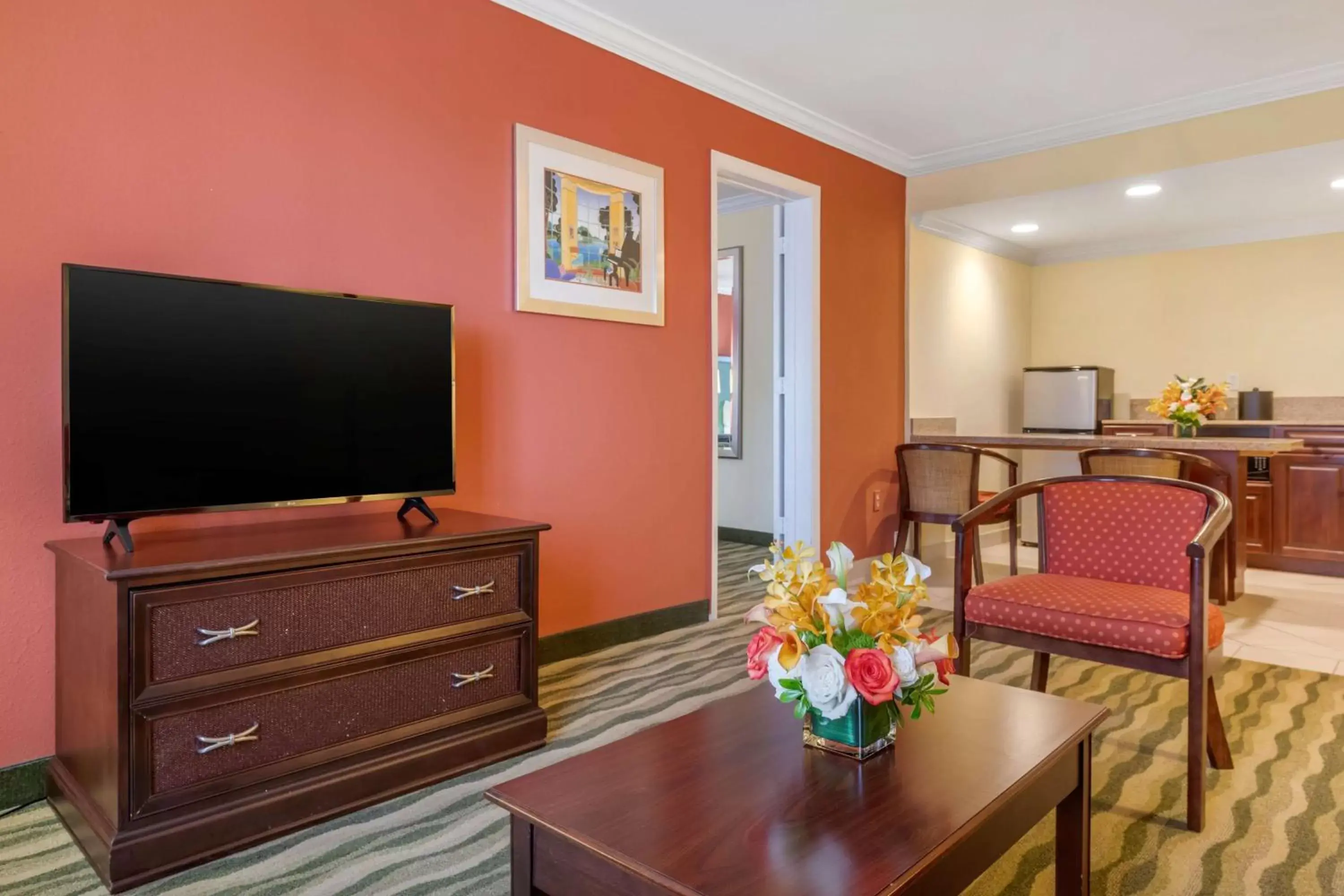 Photo of the whole room, TV/Entertainment Center in Best Western Plus Palm Beach Gardens Hotel & Suites and Conference Ct