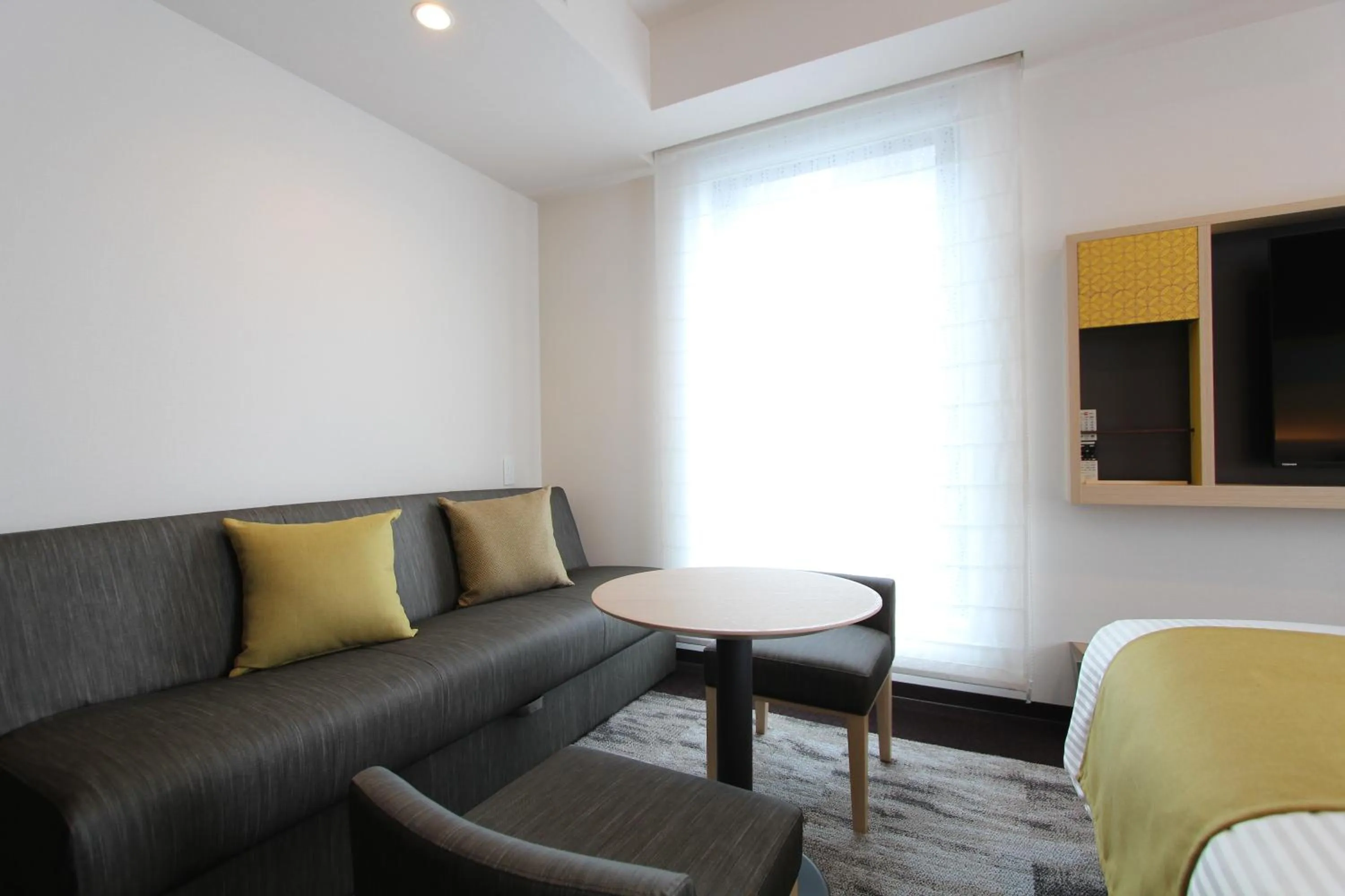 Bed in KOKO HOTEL Tsukiji Ginza