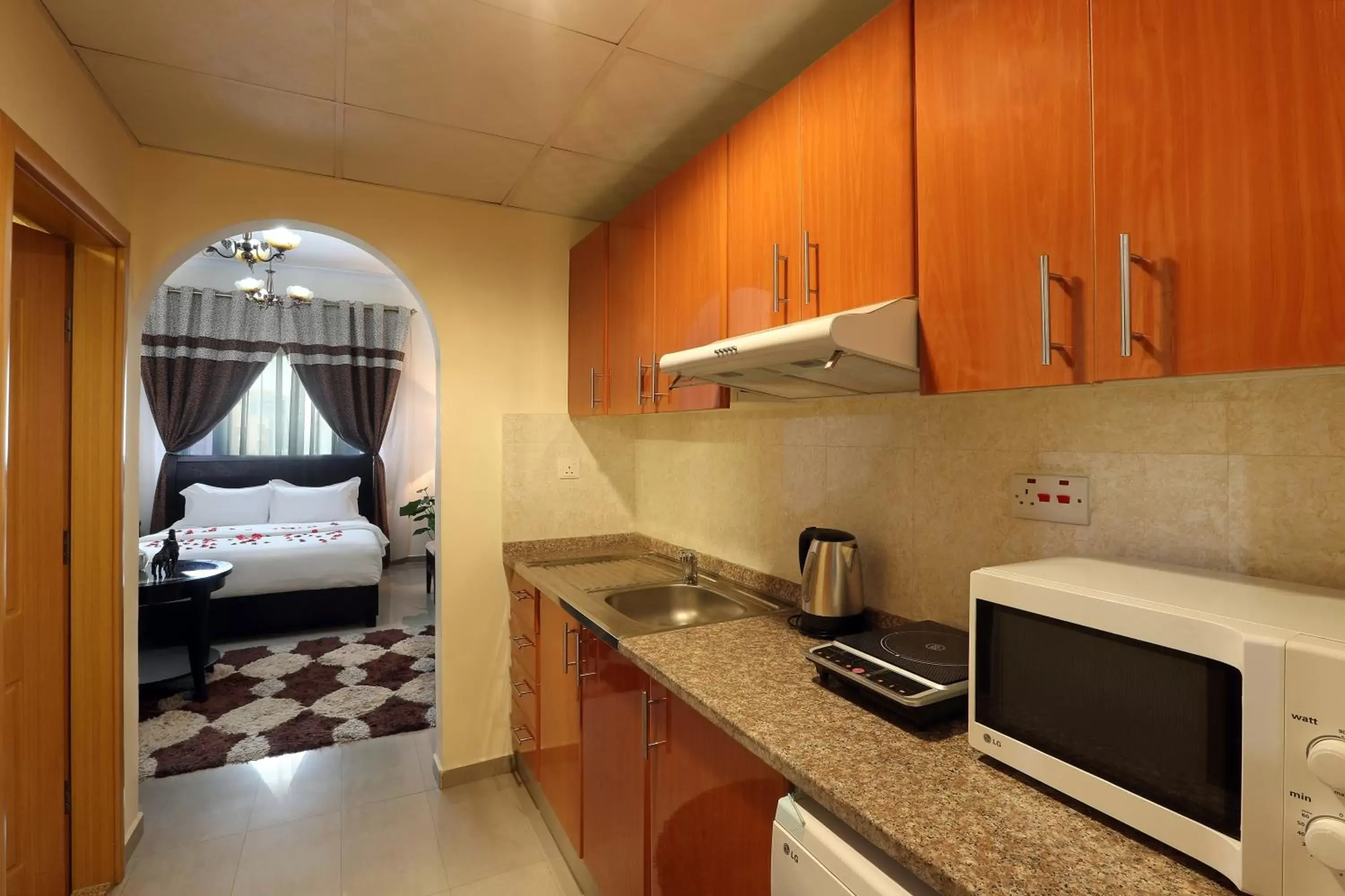 Kitchen/Kitchenette in Al Smou Hotel Apartments - MAHA HOSPITALITY GROUP