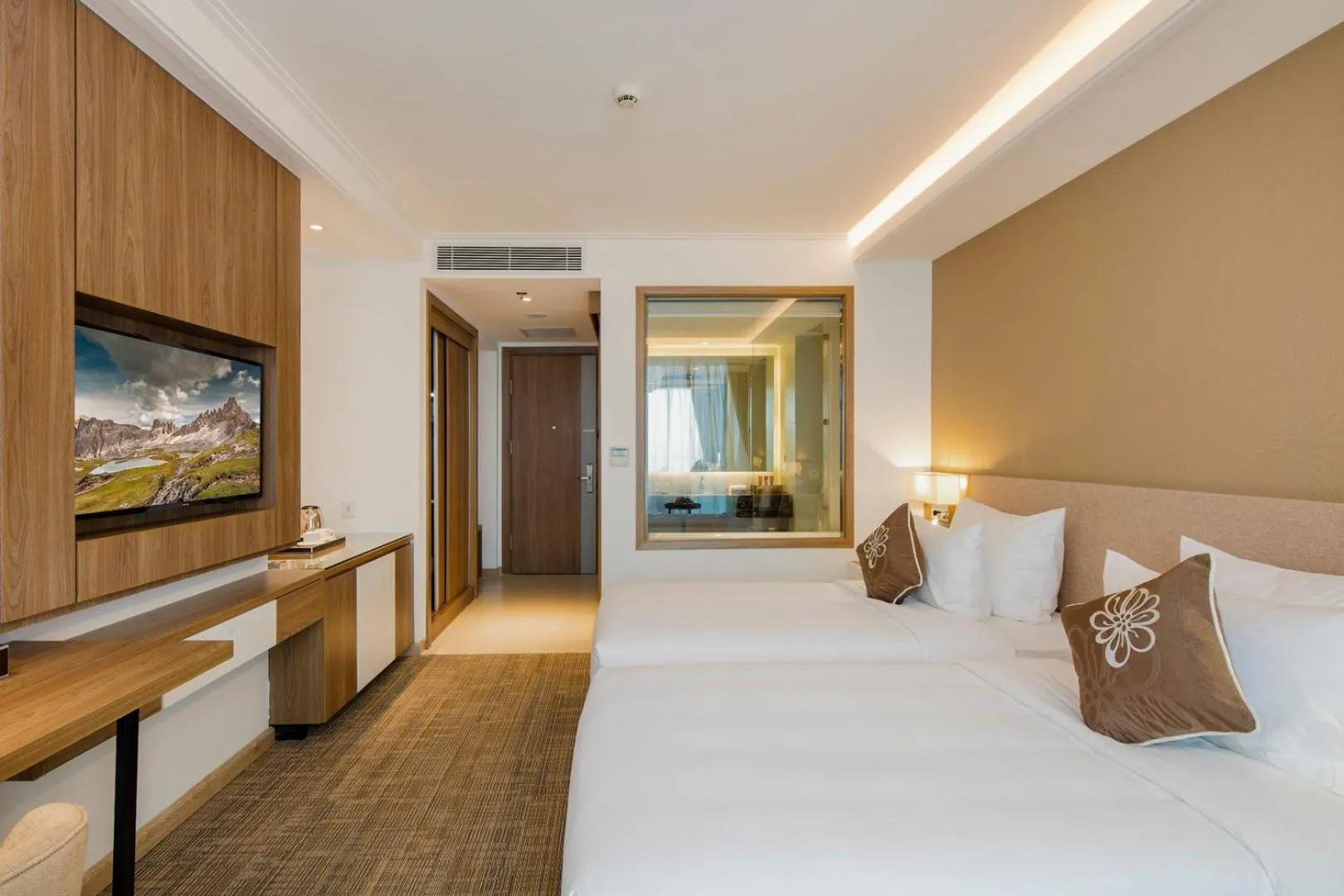 Bed in Comodo Nha Trang Hotel