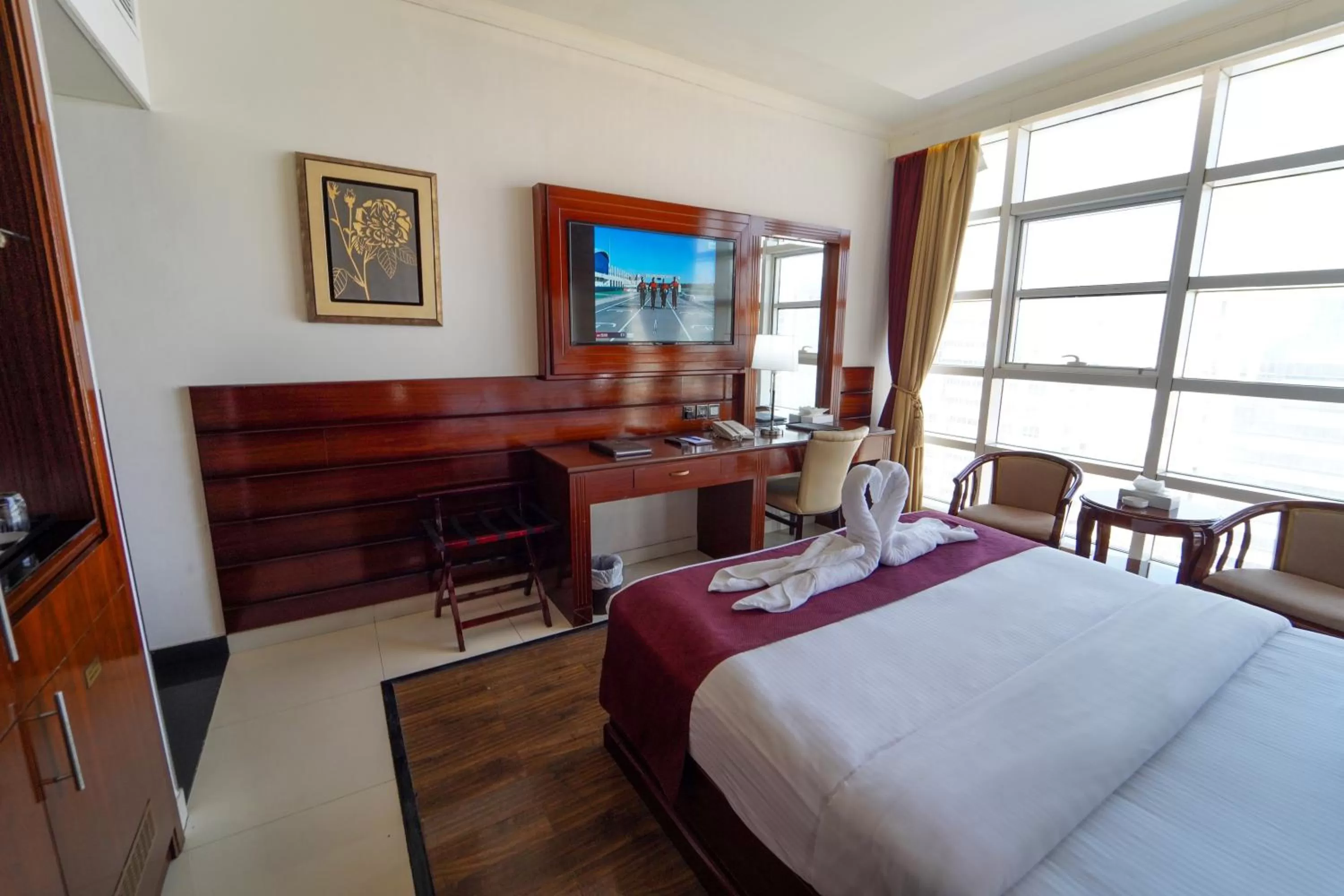 Bed in Queen Palace Hotel