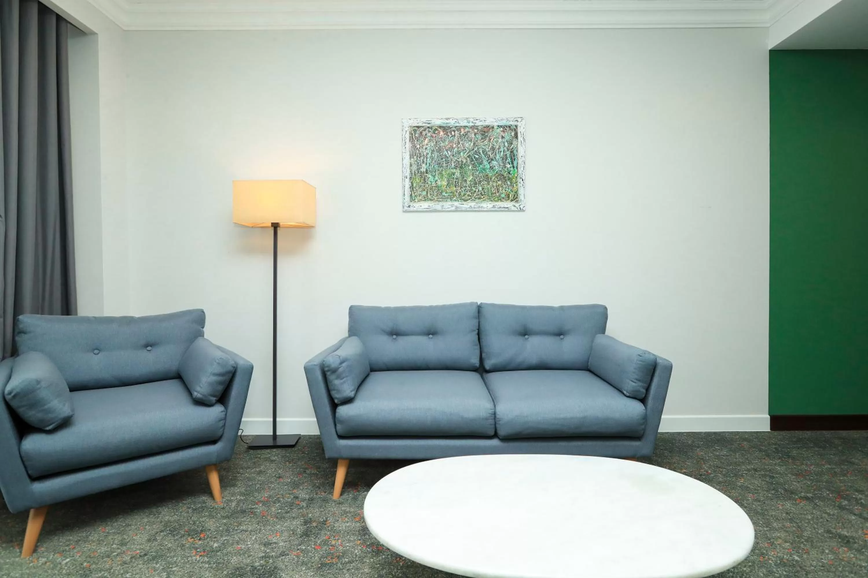 Seating area in Pine Astoria Hotel