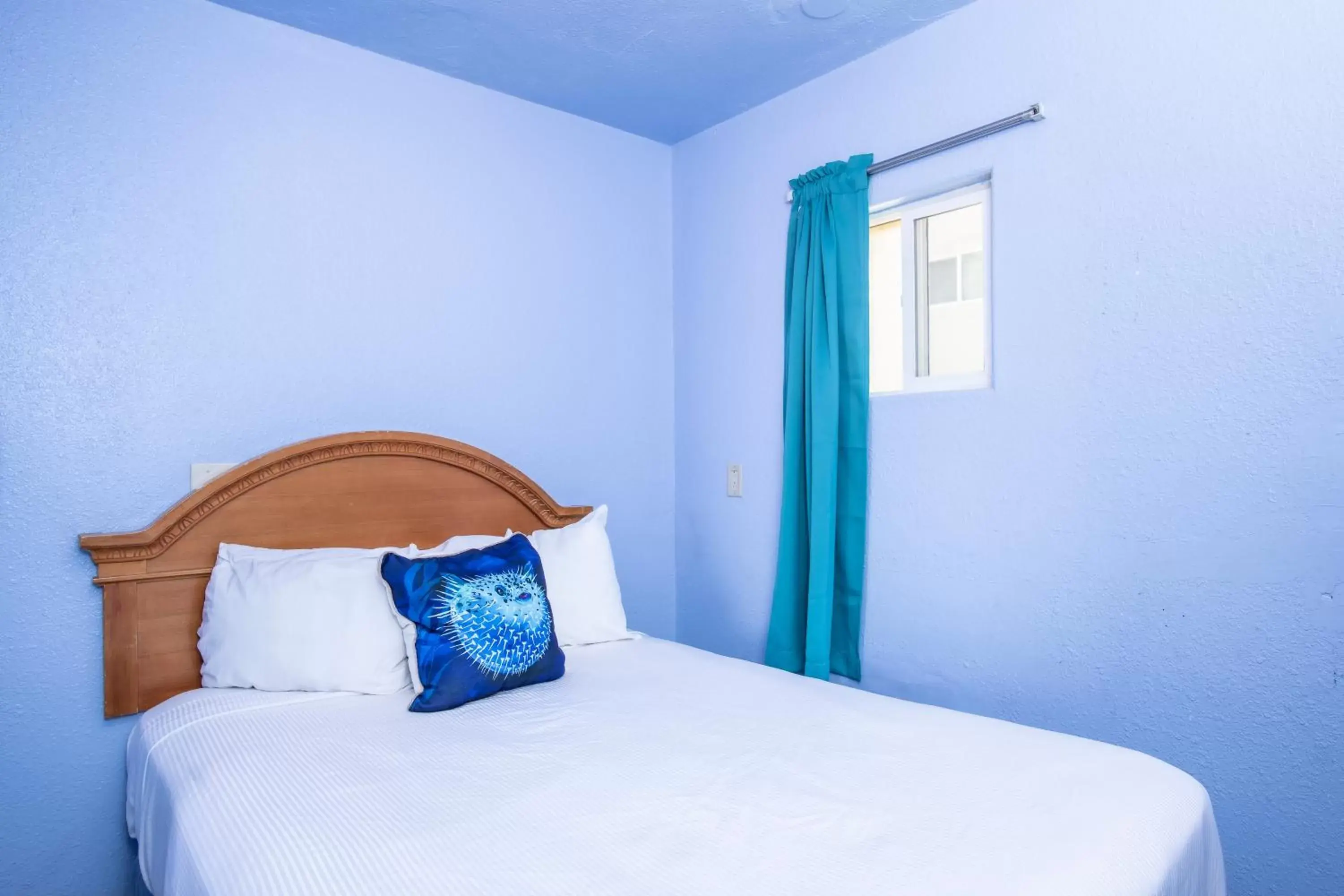 Bed in Aqua Breeze Inn Bed in Aqua Breeze Inn