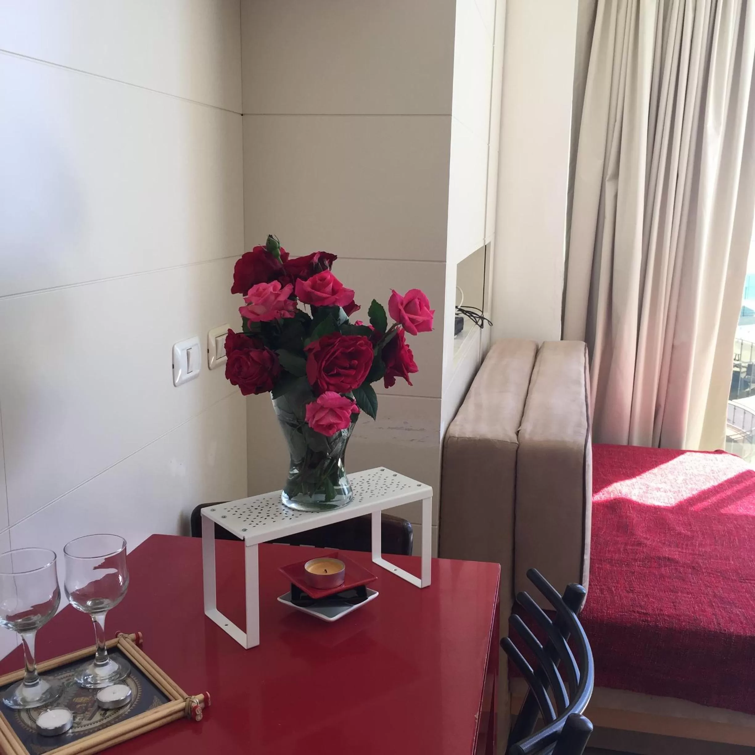 Seating area, Bed in Raphael Apartments