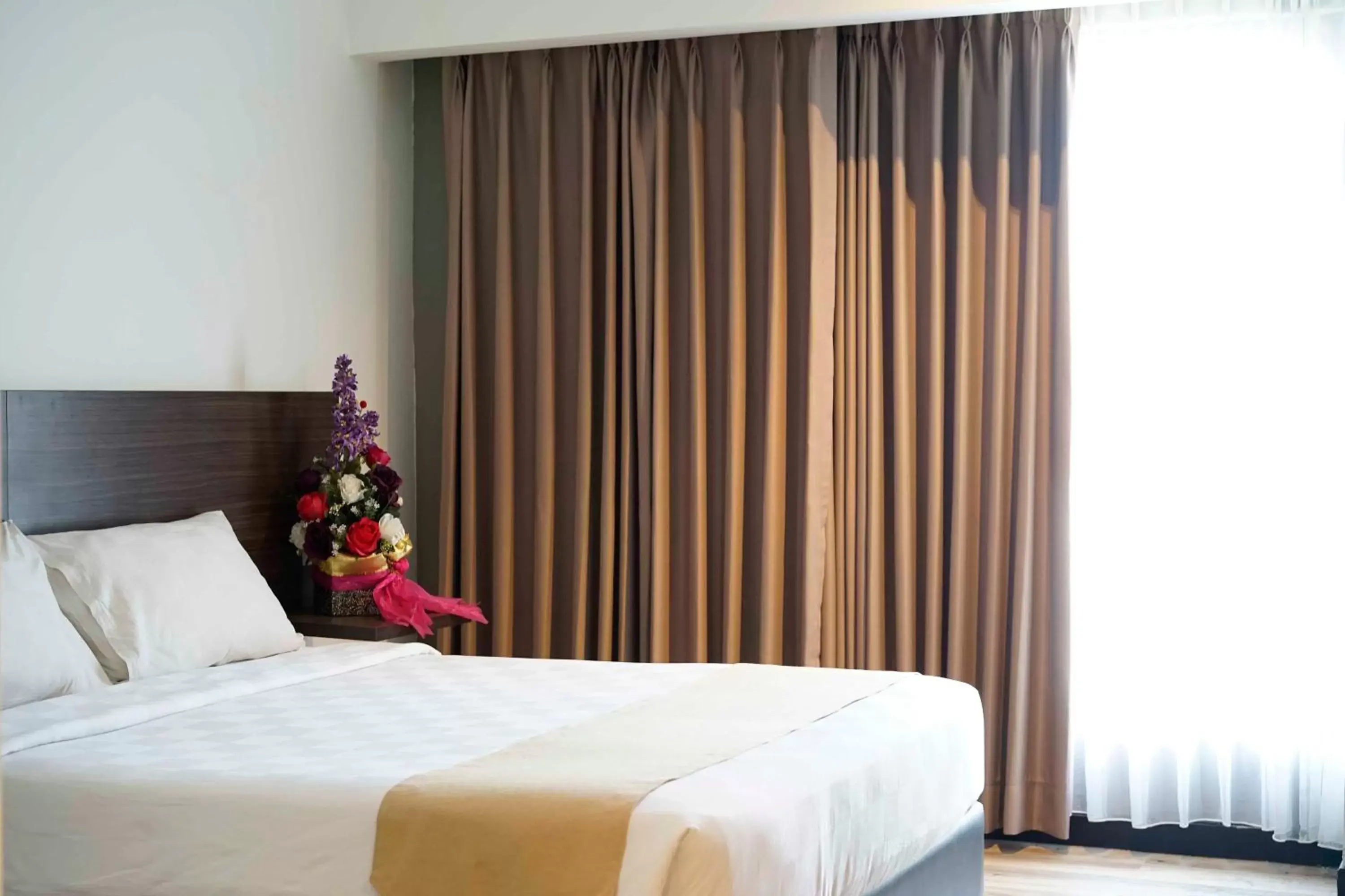 Bedroom, Bed in Yunna Hotel Lampung