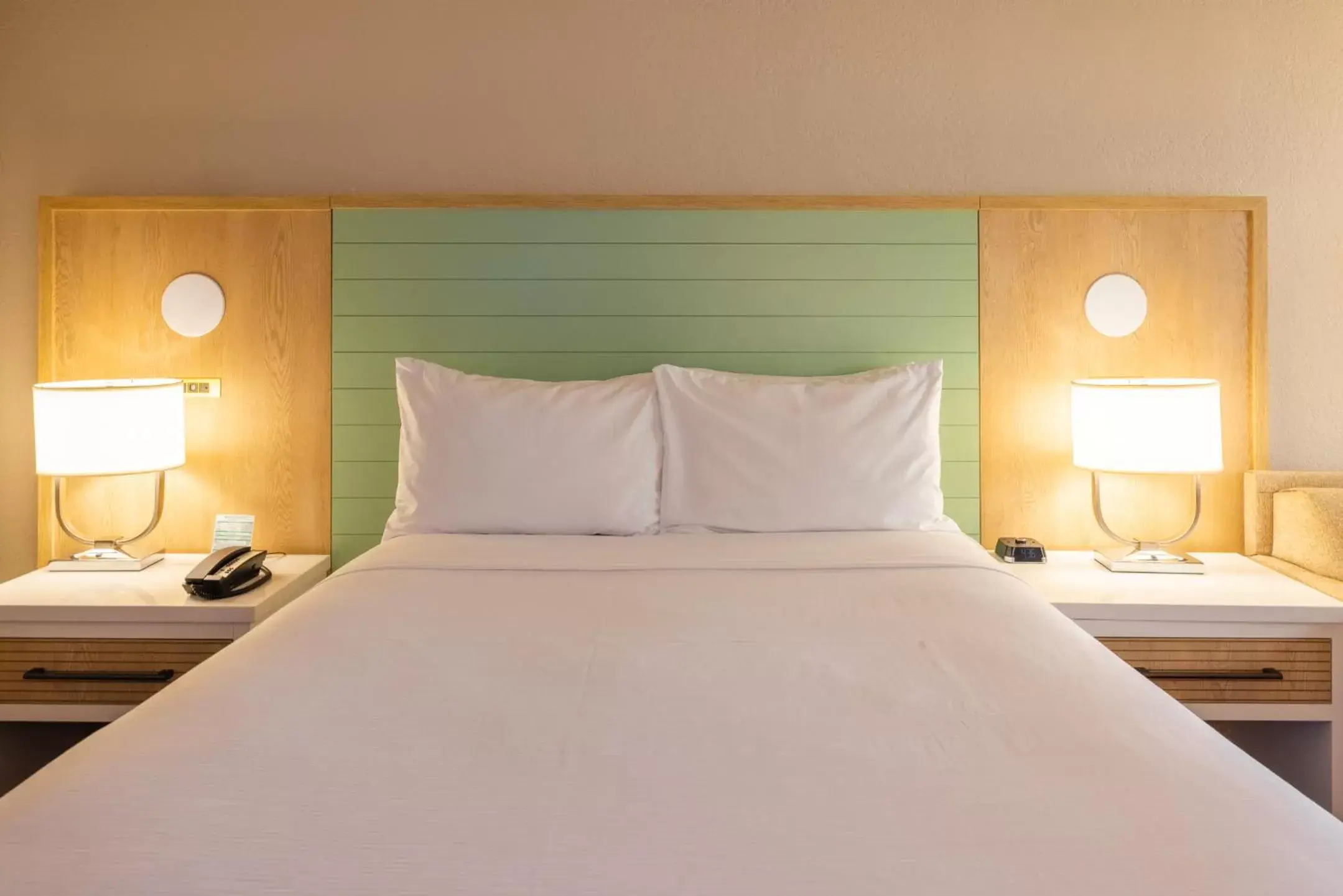 Bed in Wyndham Garden Lake Buena Vista Disney Springs® Resort Area