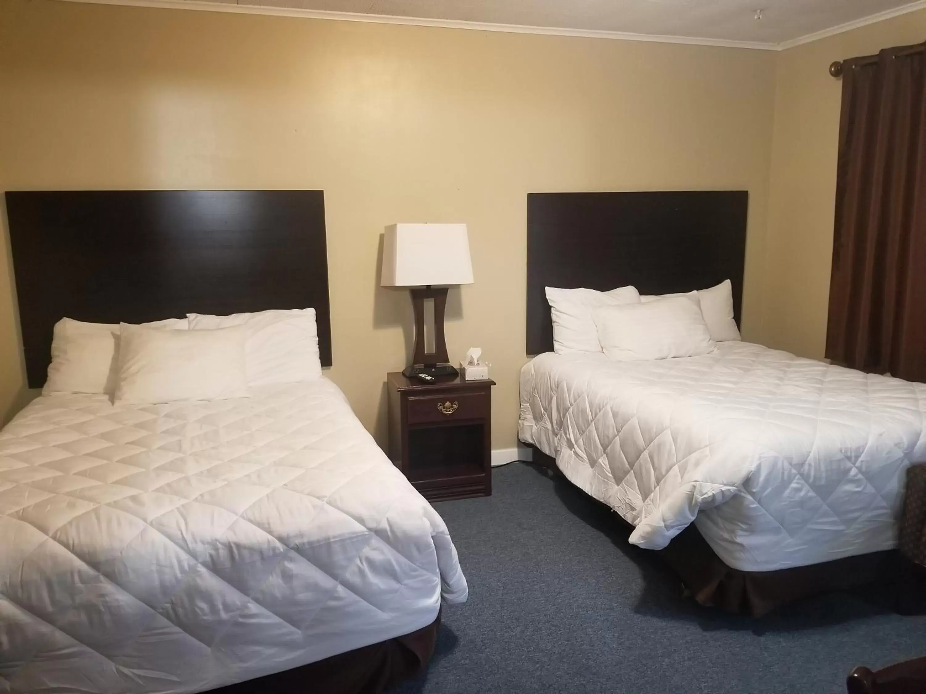 Bed in Fiesta City Motel