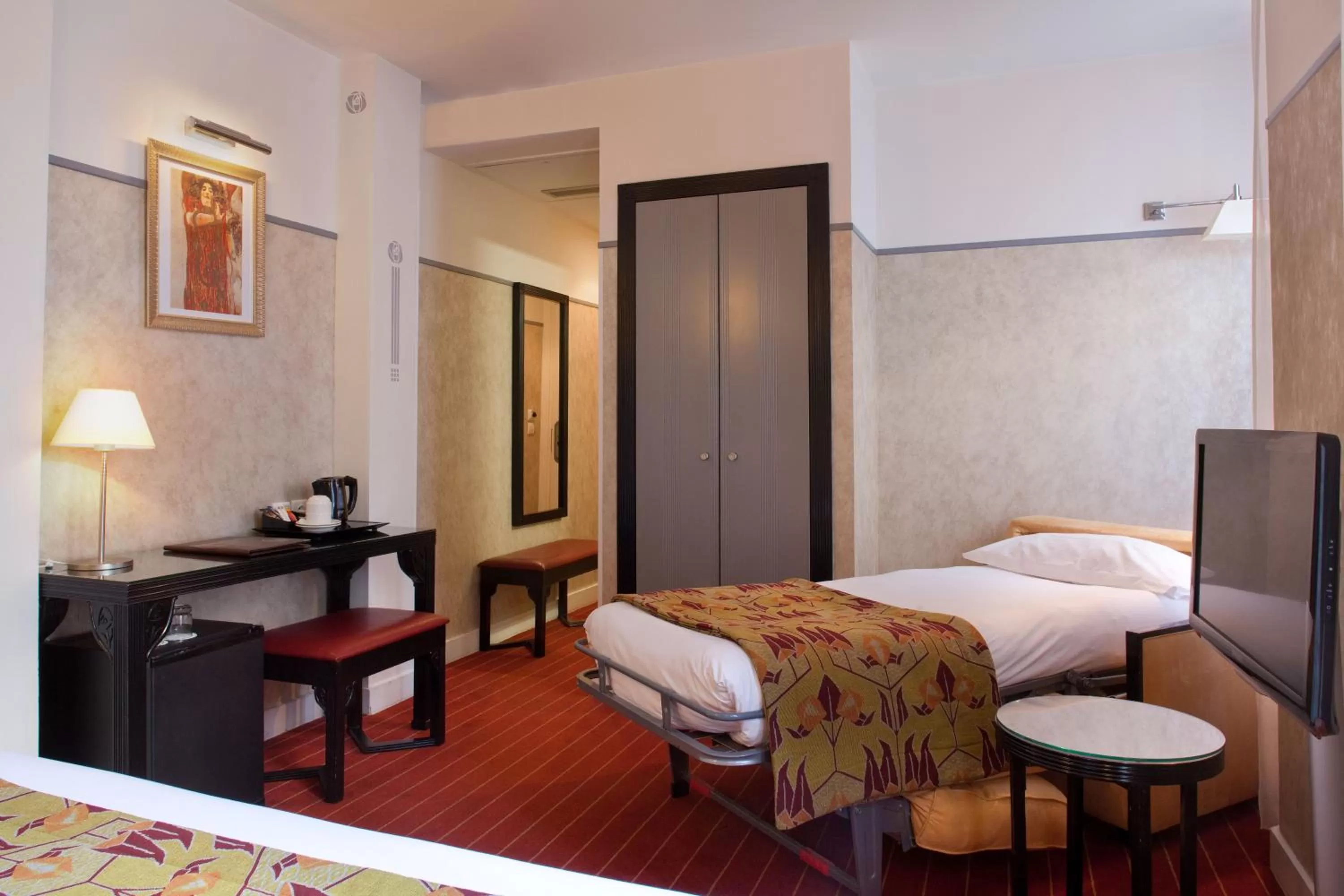 Photo of the whole room, Bed in Hotel Eiffel Seine